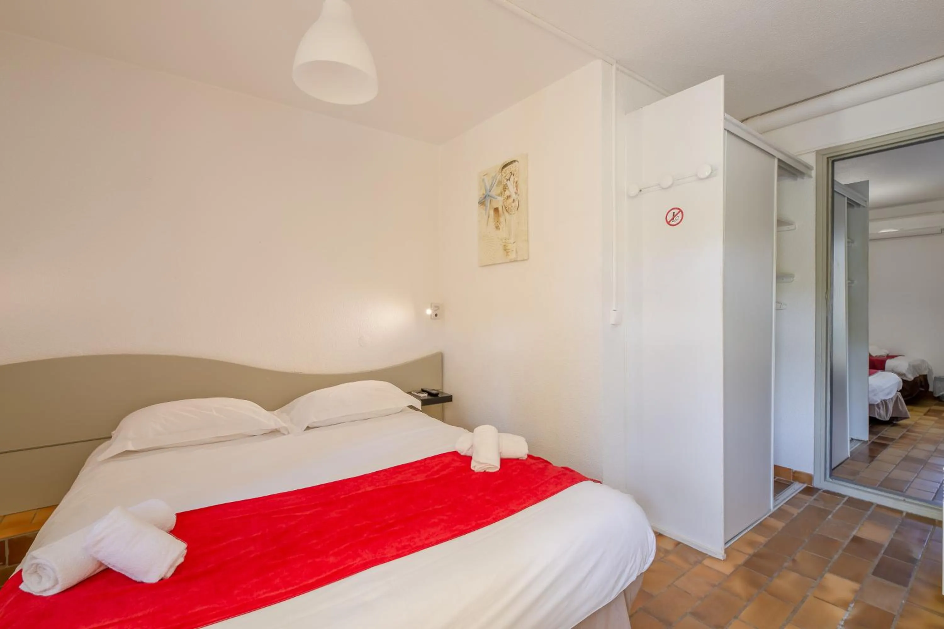 Bed in Marina Hôtel Club