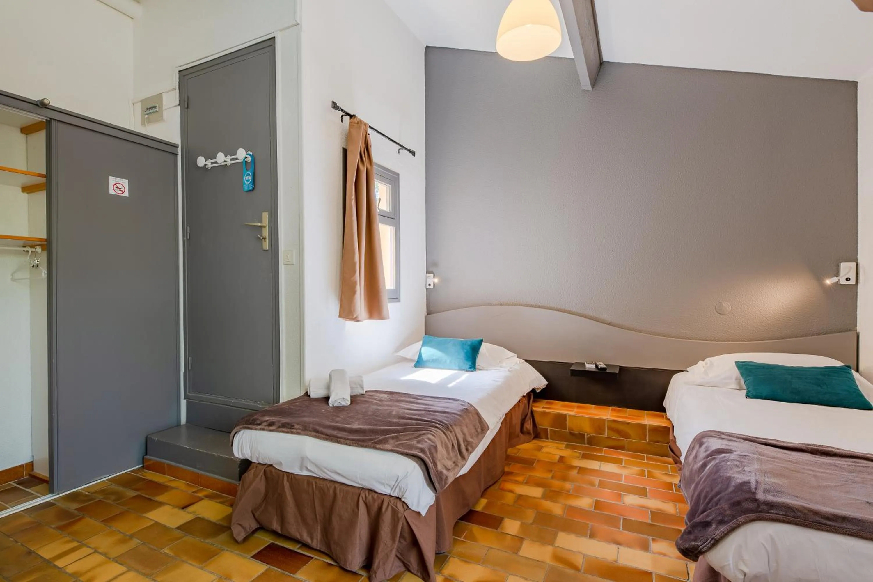 Bed in Marina Hôtel Club