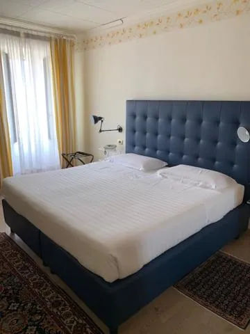 Bed in Lolli Palace Hotel