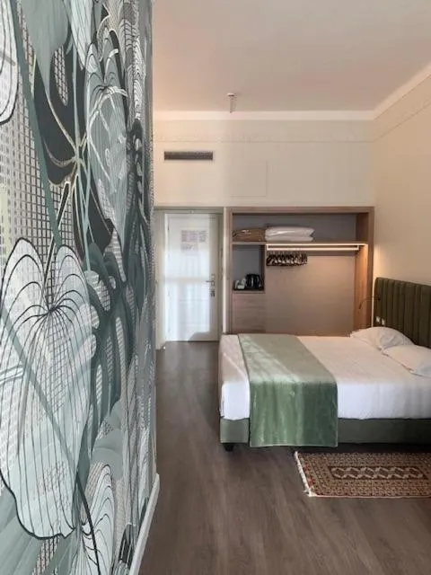 Bed in Lolli Palace Hotel