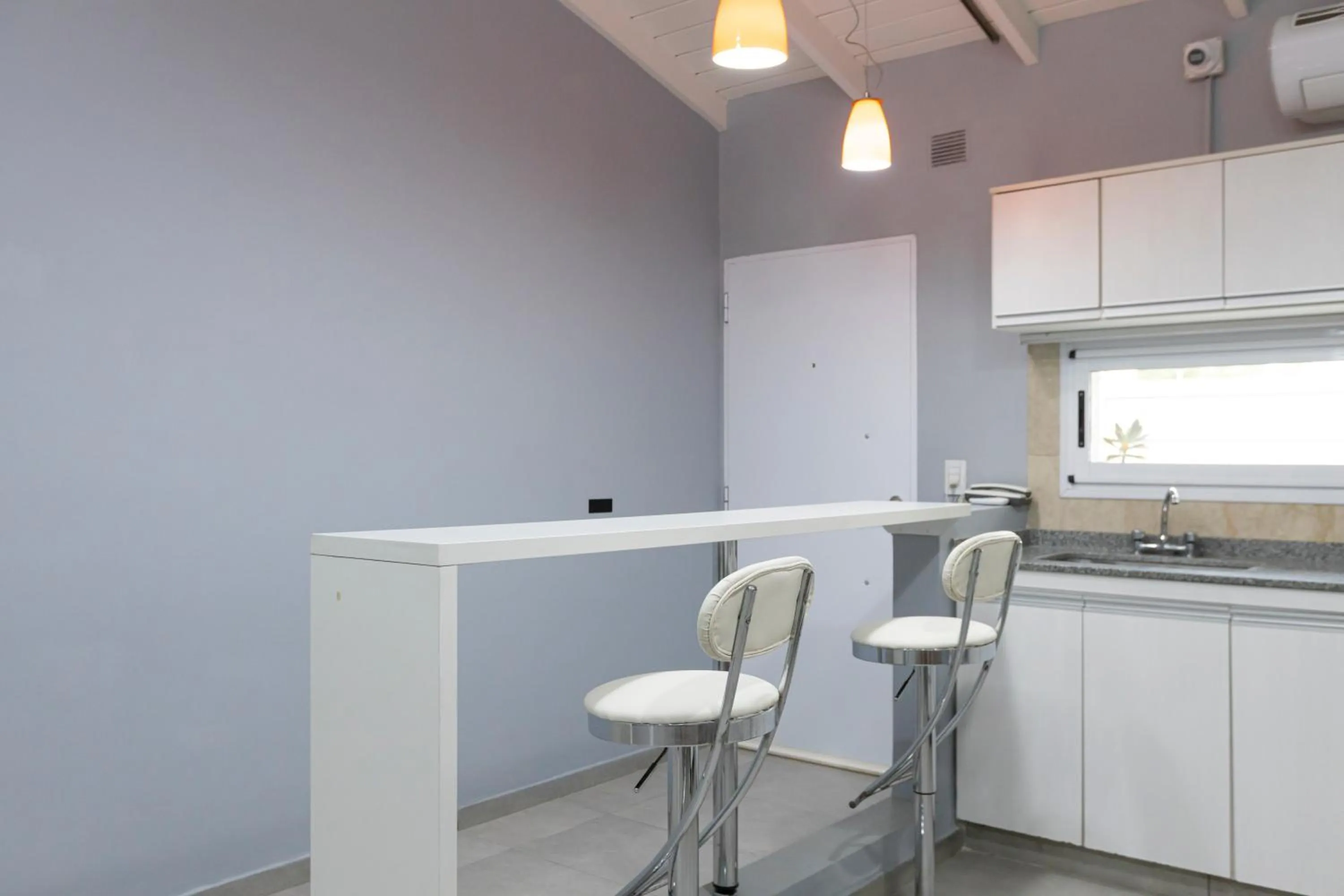 Kitchen or kitchenette in Gugasuites