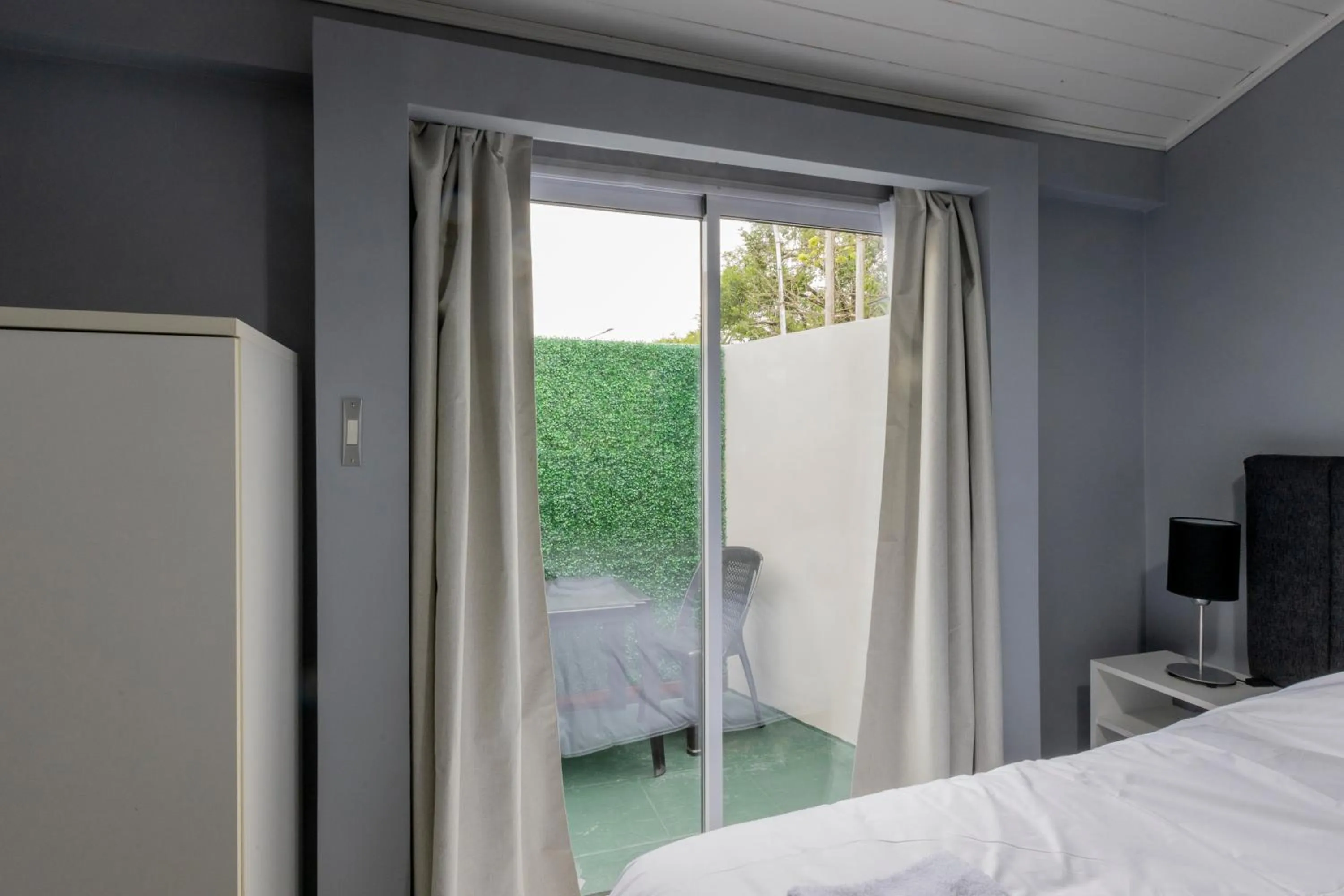 Patio, Bed in Gugasuites