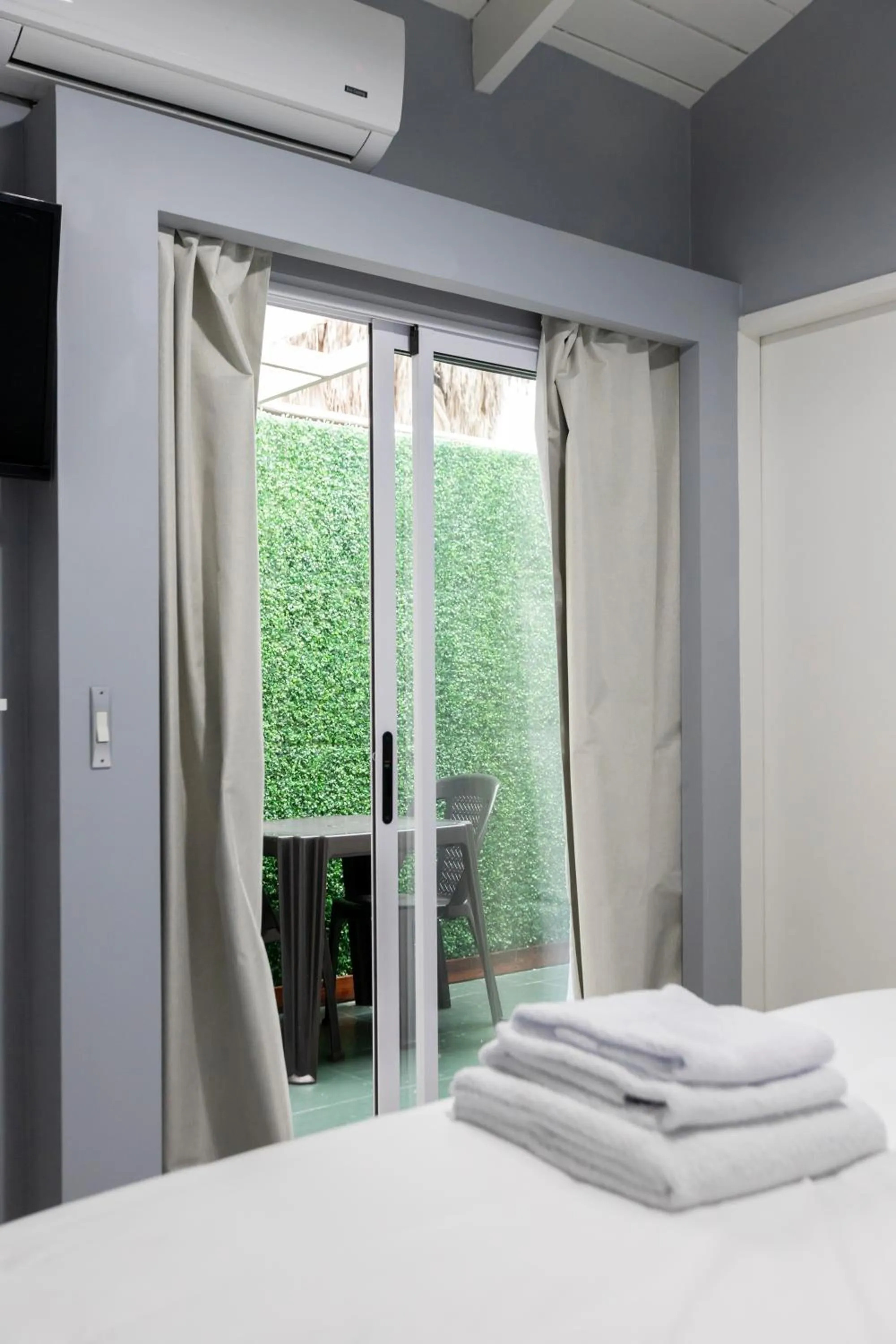 Patio, Bed in Gugasuites