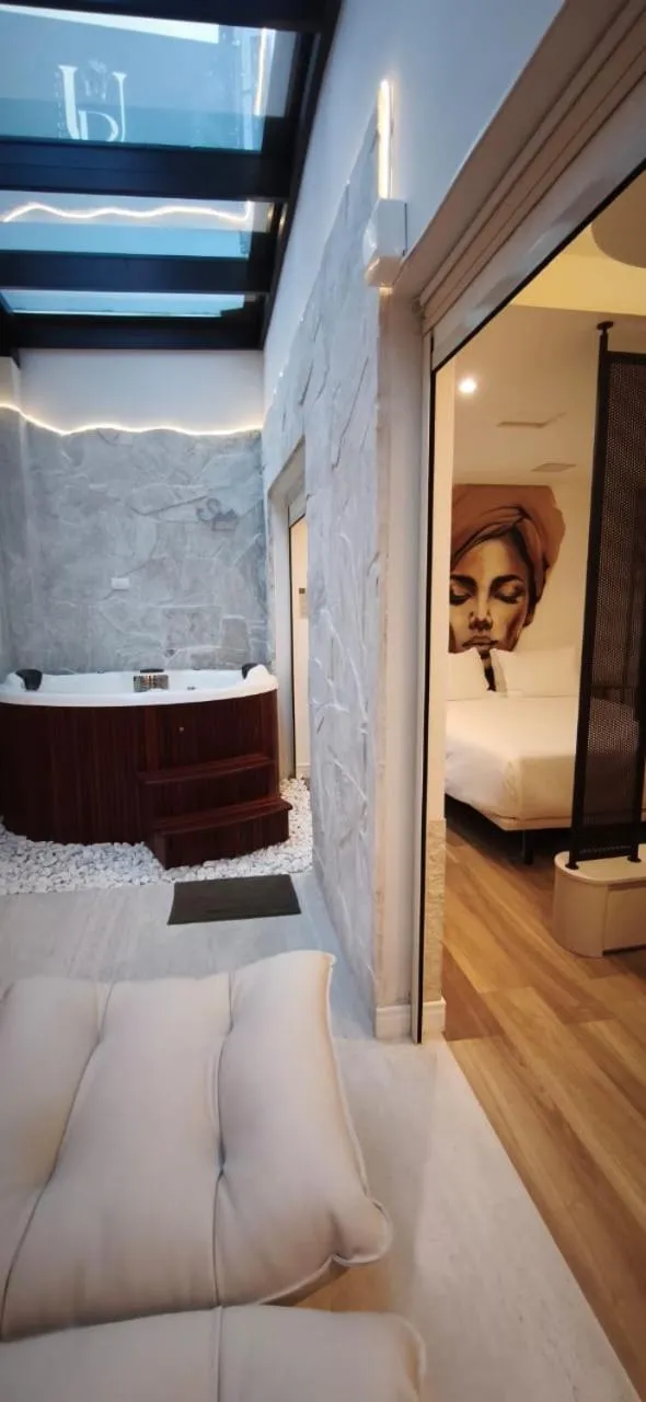 Bed in Up Hotel Boutique