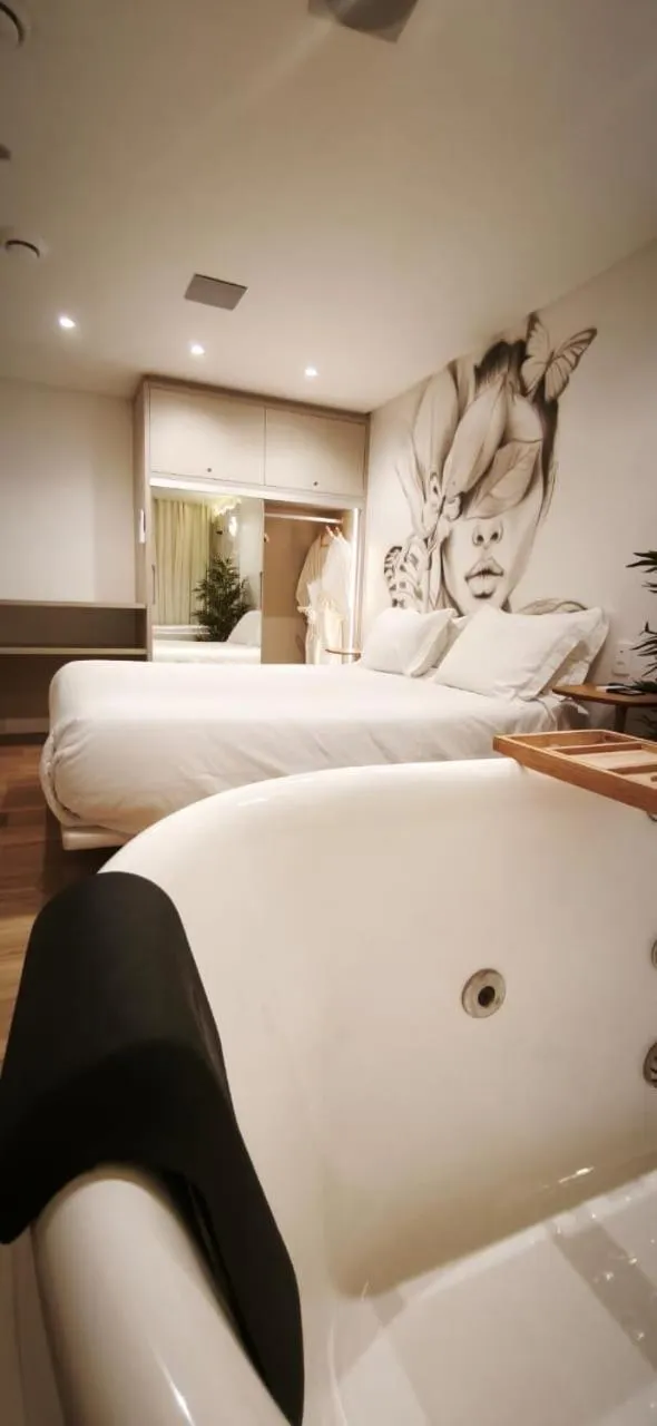 Bed in Up Hotel Boutique