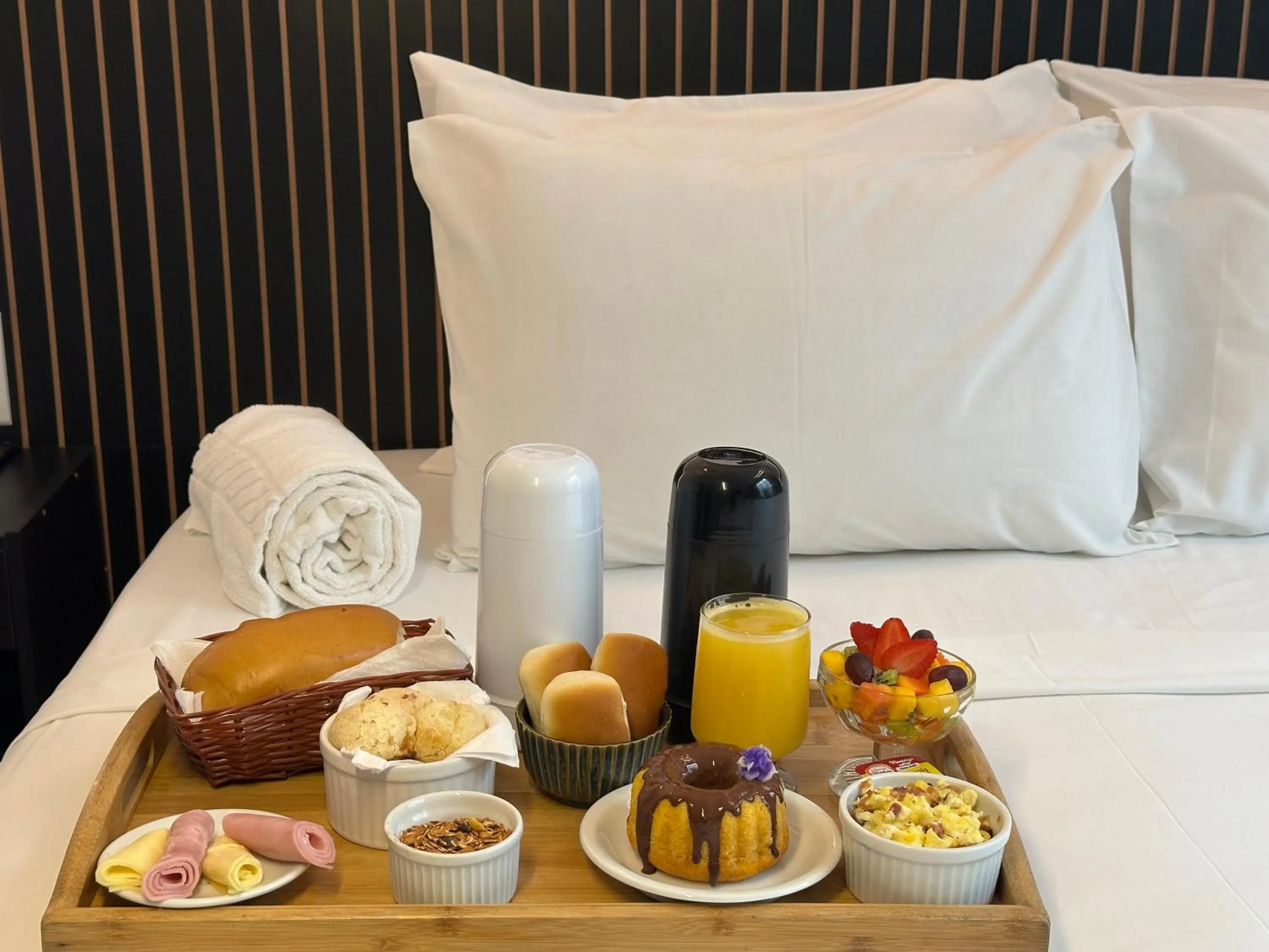 Bed in Status Elegance Hotel