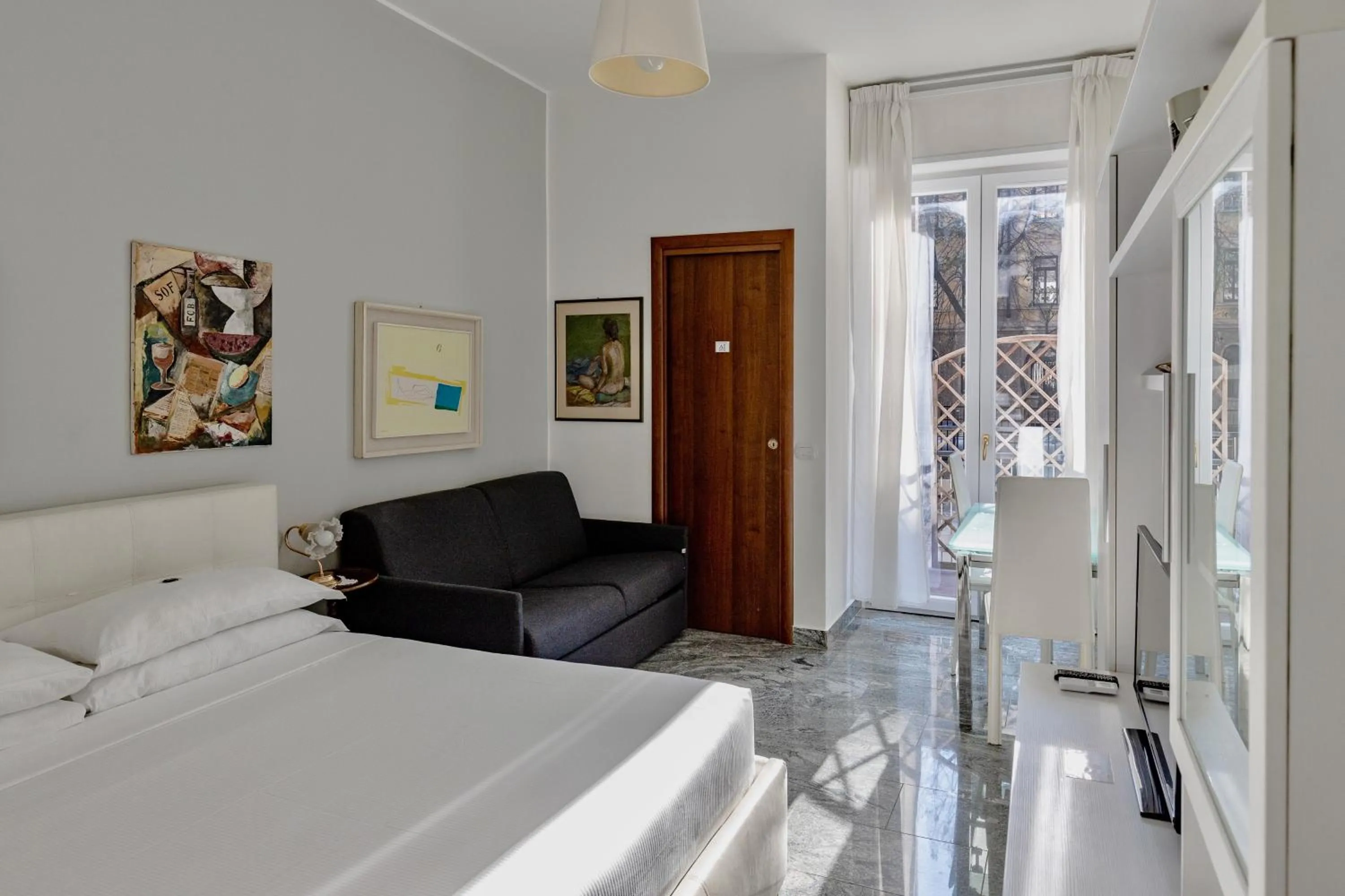 Photo of the whole room, Bed in Aiello Suites Executive