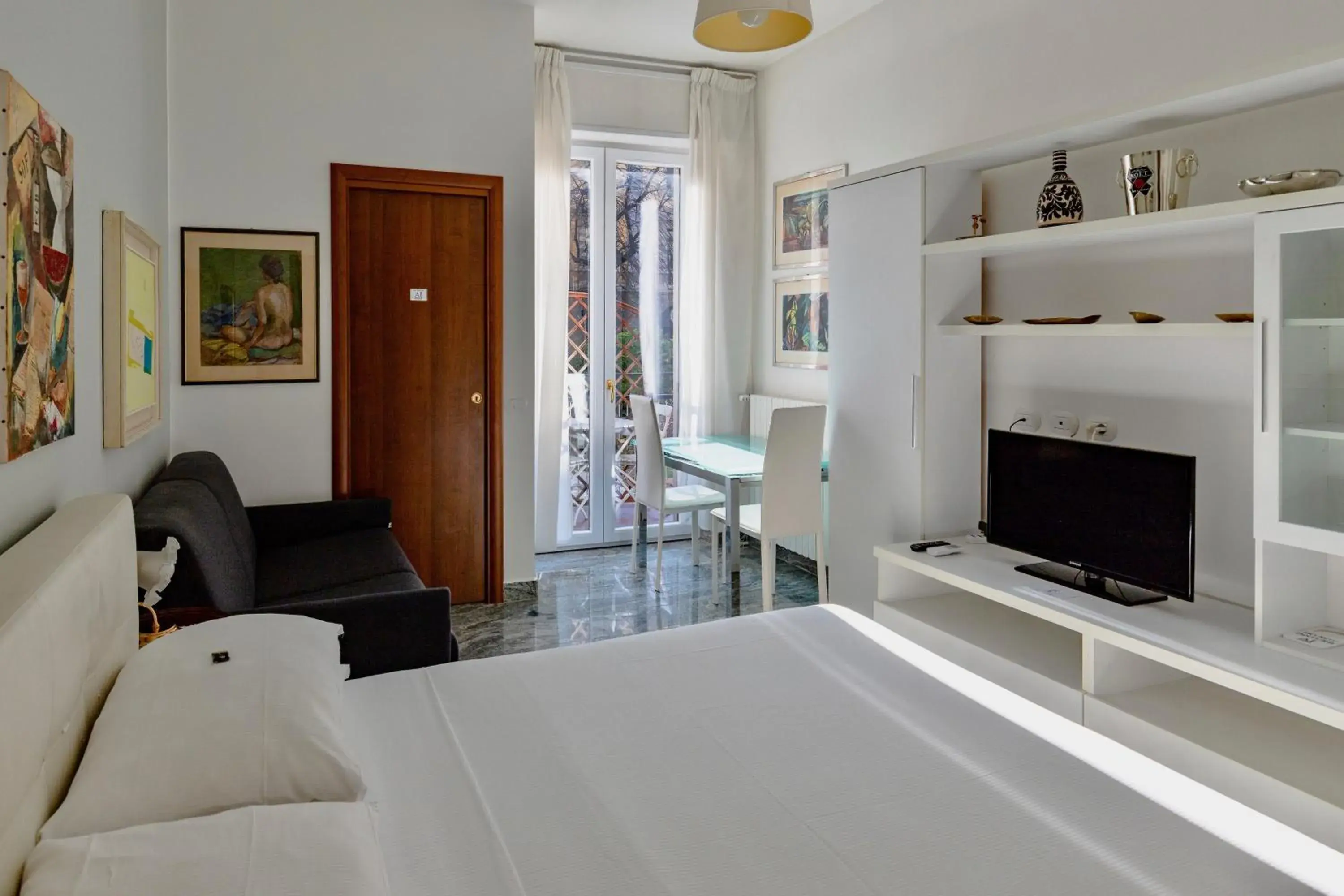 Photo of the whole room, Bed in Aiello Suites Executive Photo of the whole room, Bed in Aiello Suites Executive