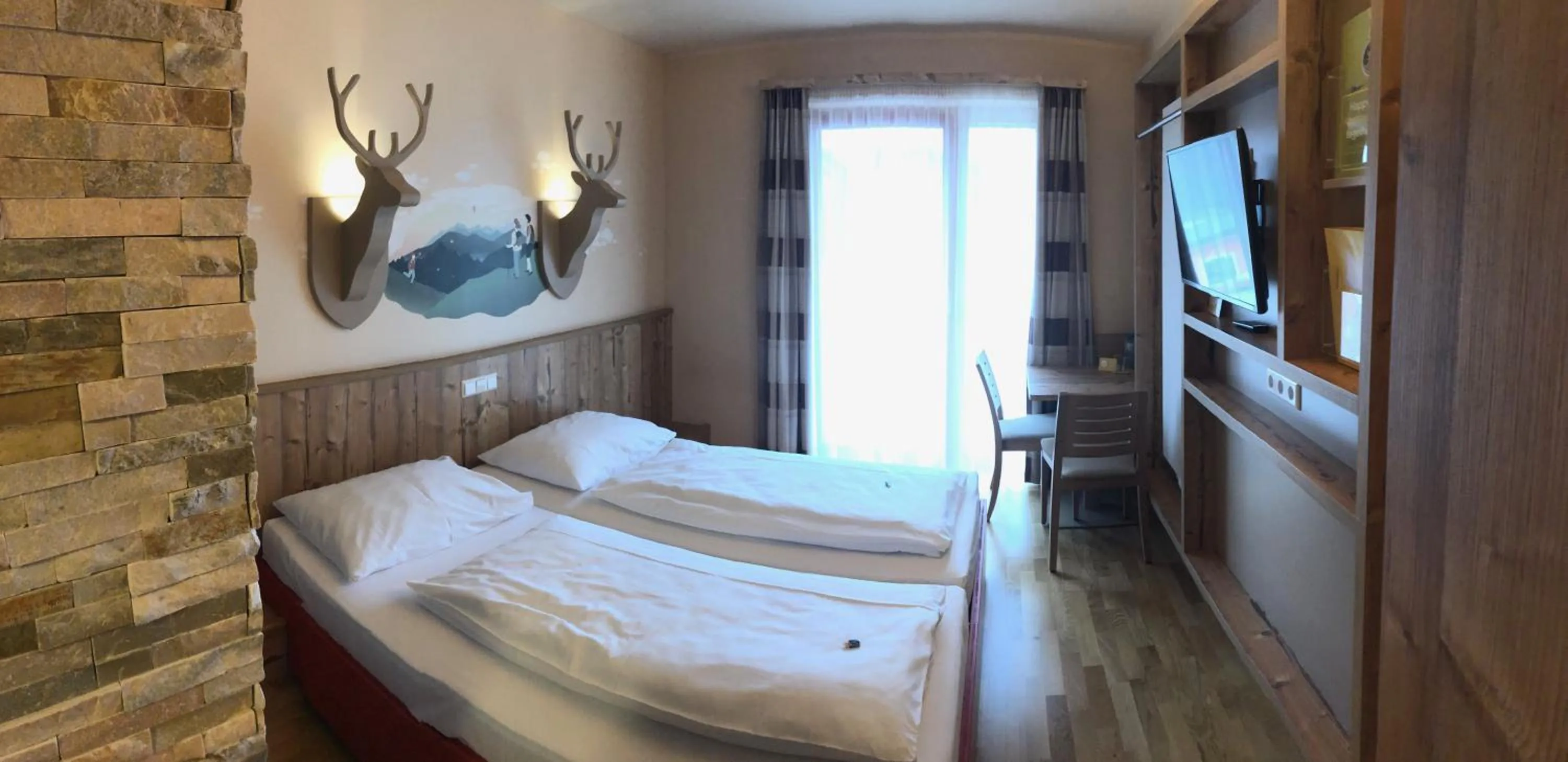 Photo of the whole room, Bed in JUFA Hotel Annaberg
