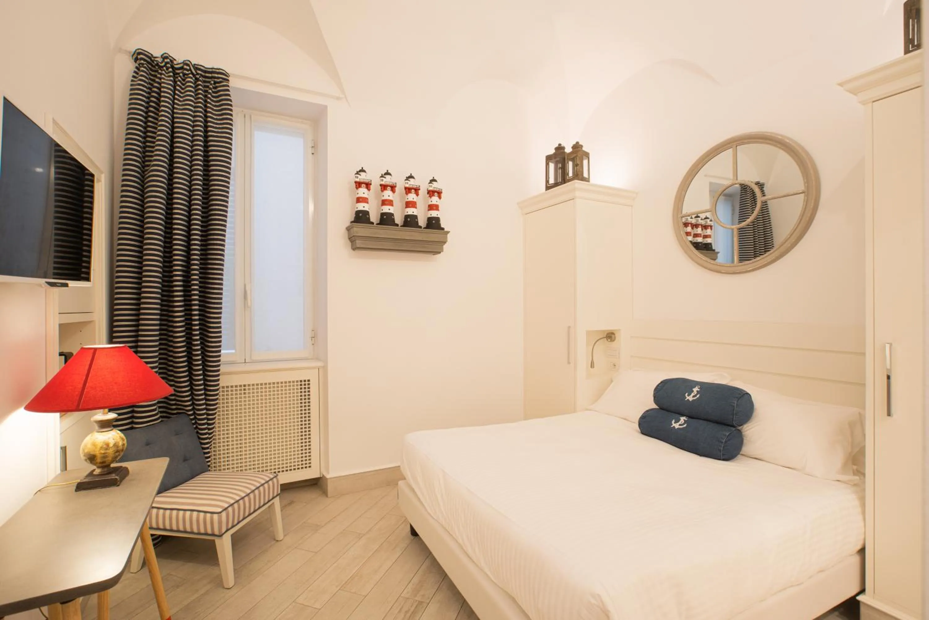 Bed in Hotel Marina Charming Rooms