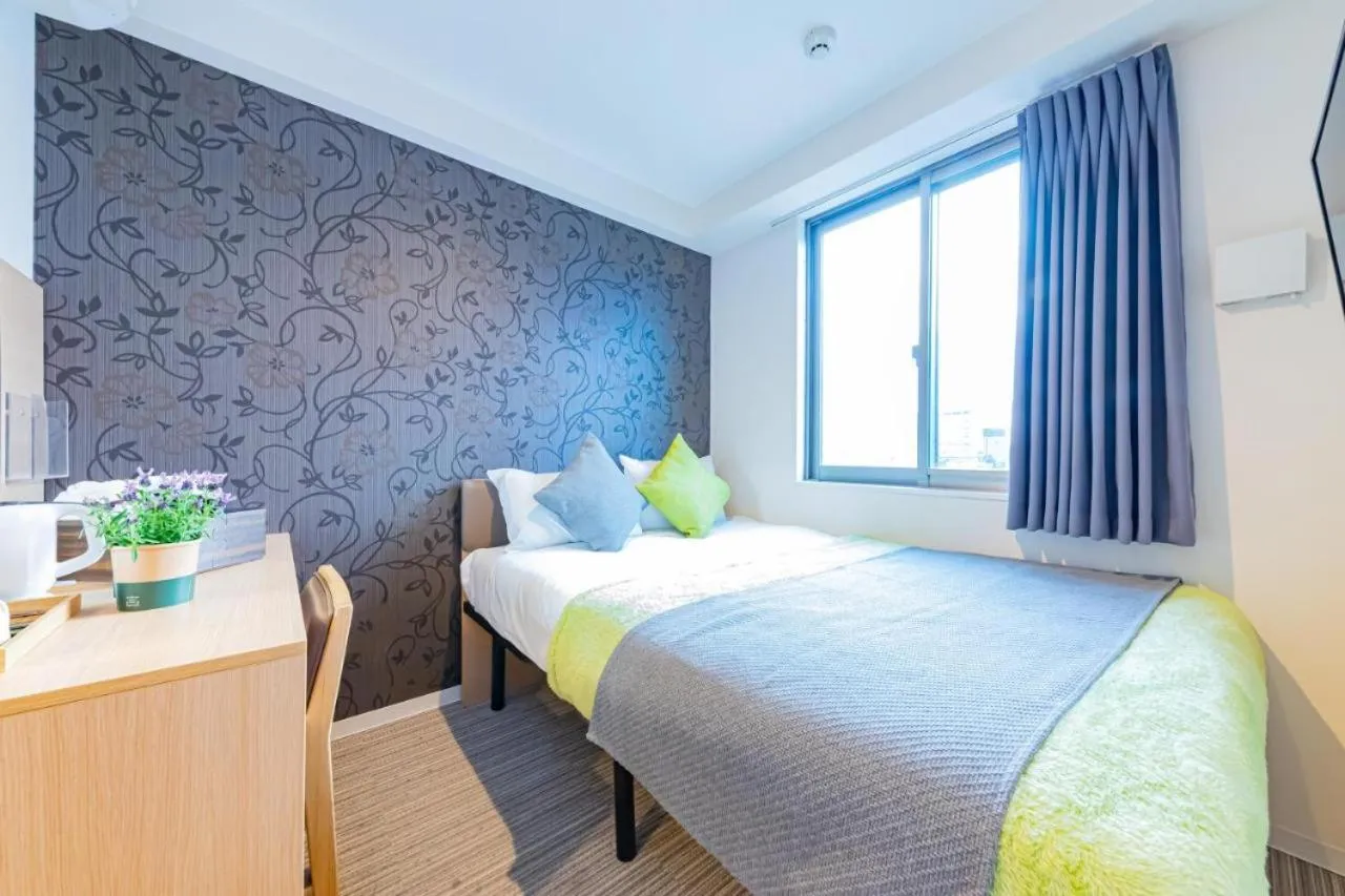 Photo of the whole room, Bed in JA Hotel Namba South