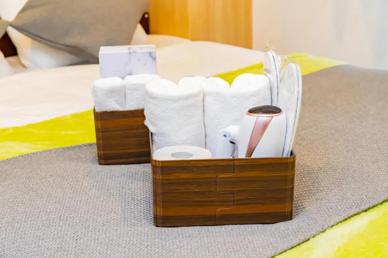 towels, Bed in JA Hotel Shinfukae