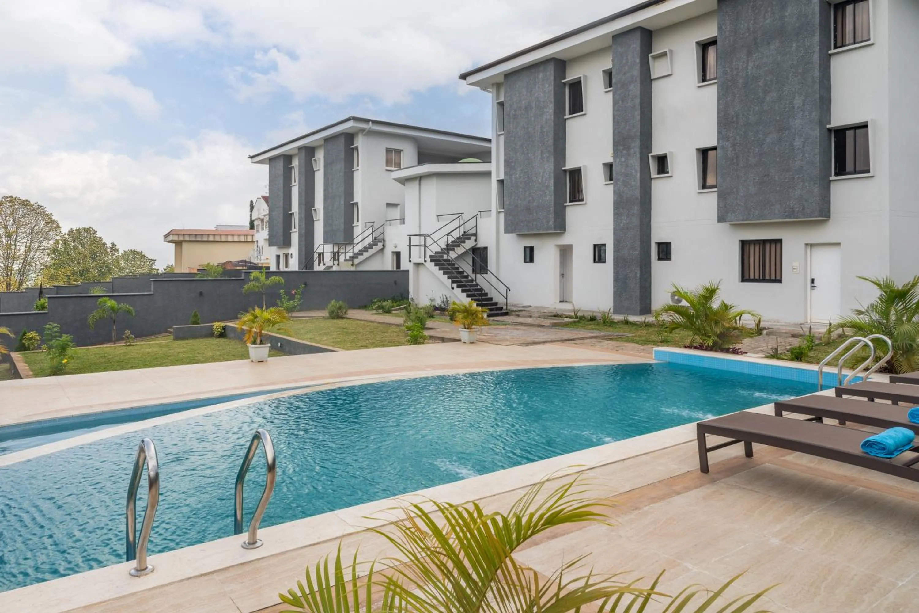 Property building in Clay House by Husk Collection