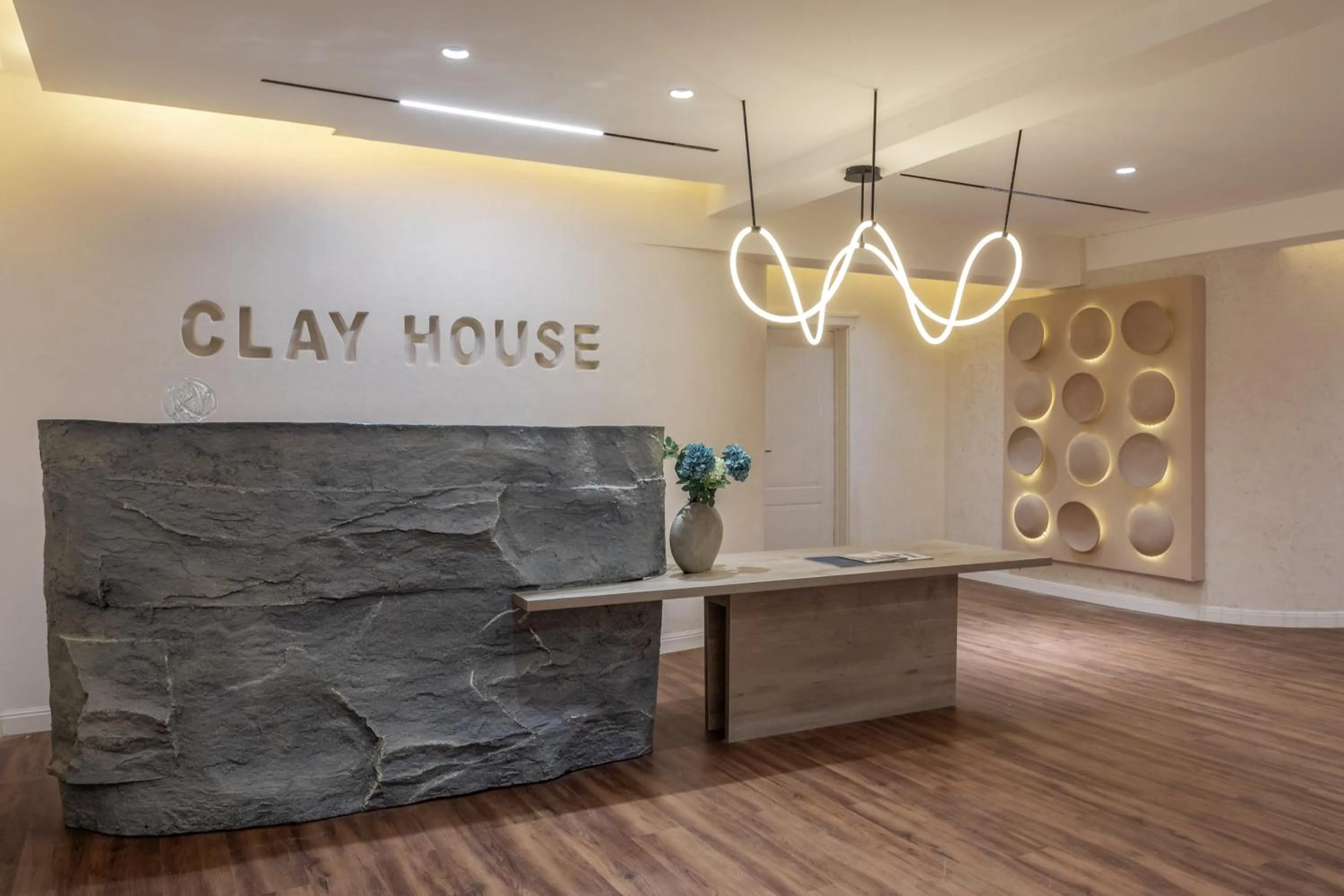 Lobby or reception in Clay House by Husk Collection