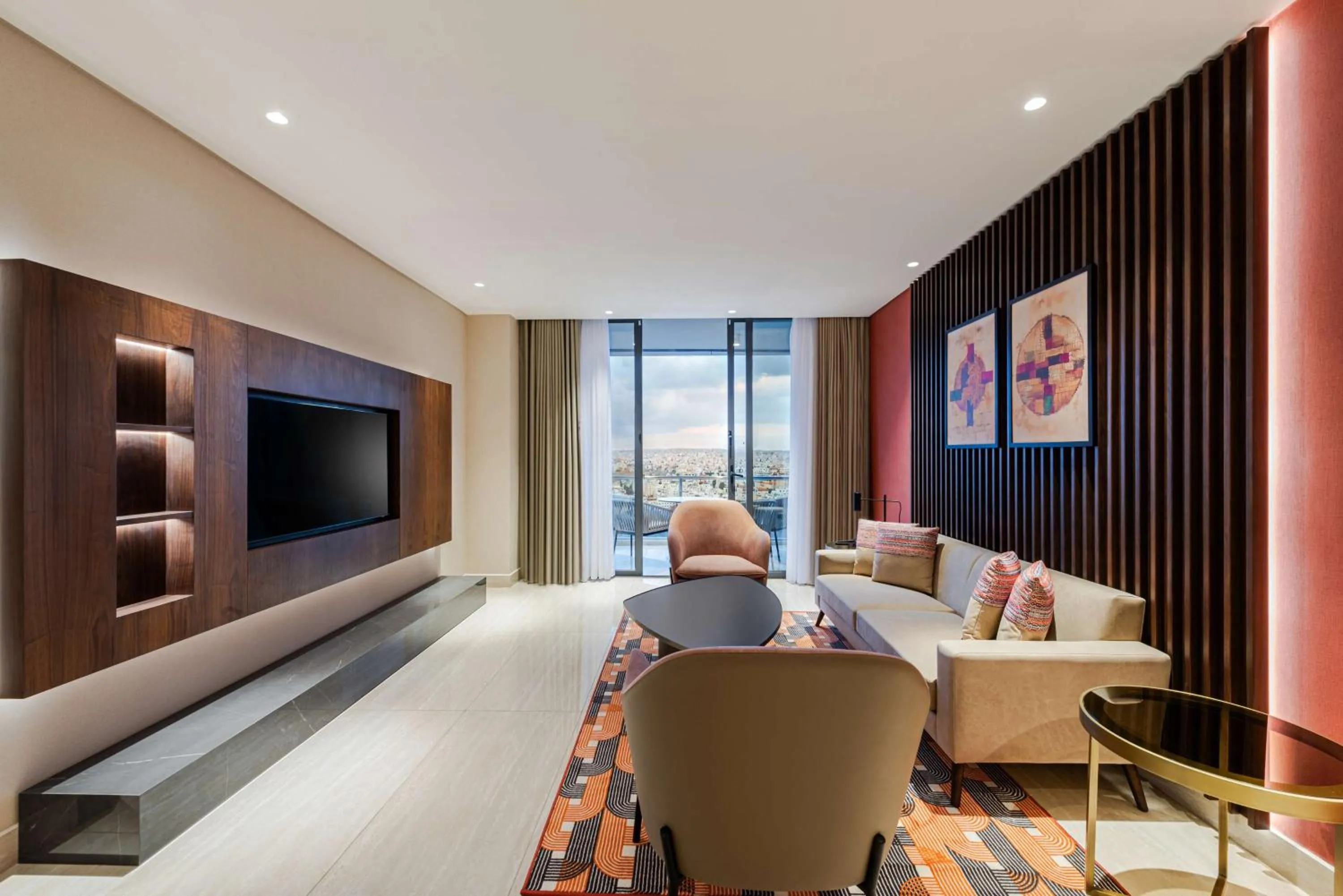 Living room, Bed in Doubletree By Hilton Amman Hotel & Residences