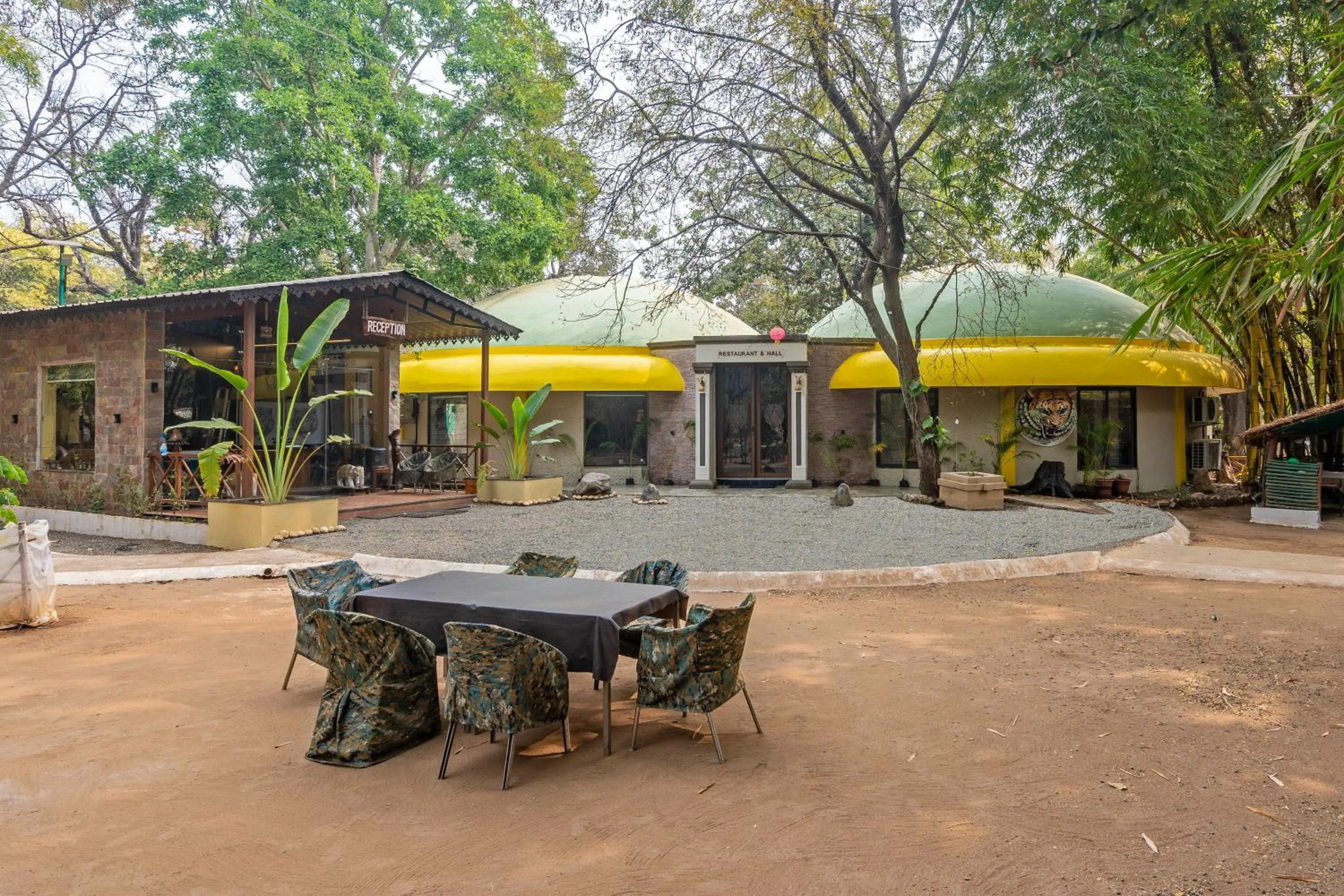 Seating area in Treebo Premium Mowgli's Den Pench with Swimming Pool