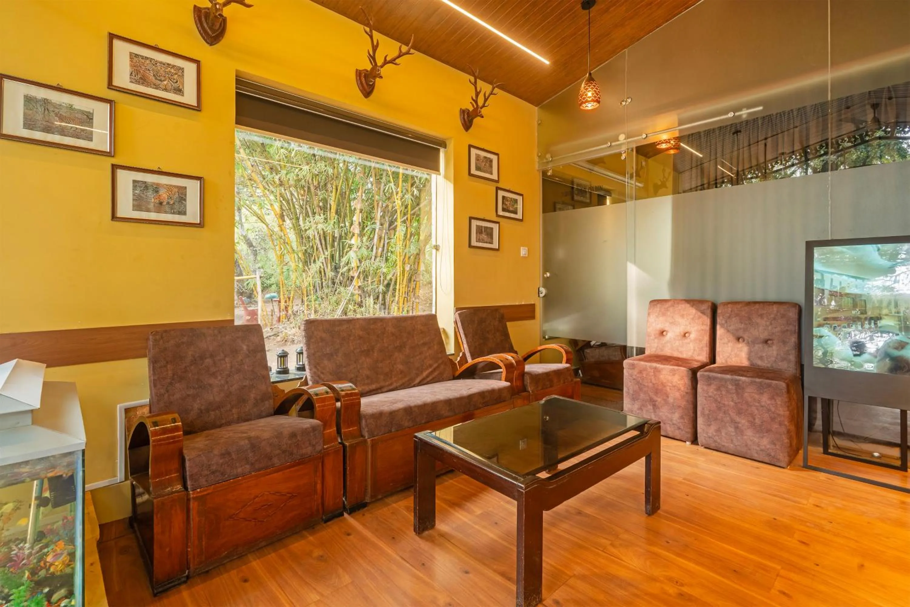 Seating area in Treebo Premium Mowgli's Den Pench with Swimming Pool