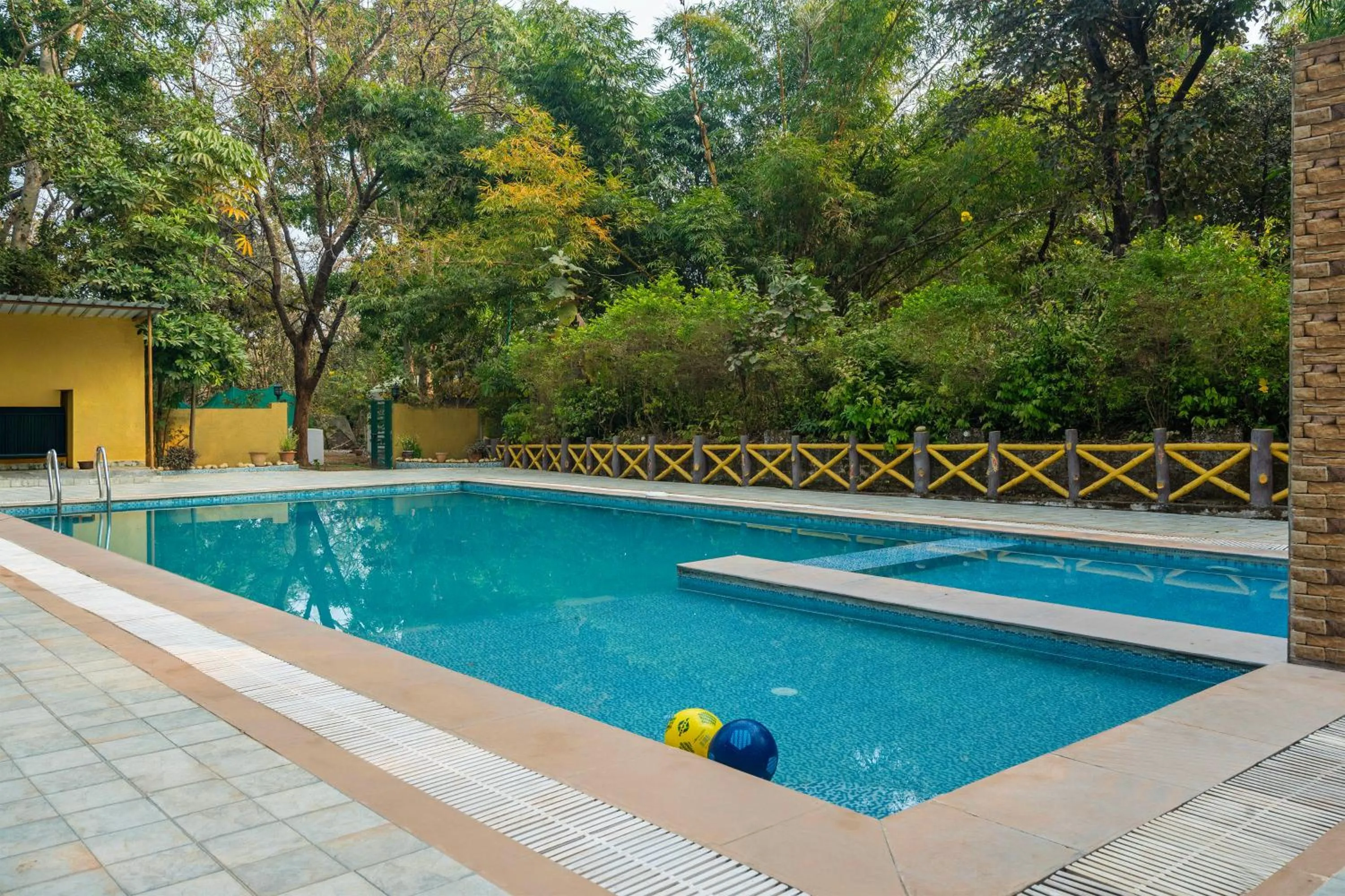 Swimming pool in Treebo Premium Mowgli's Den Pench with Swimming Pool