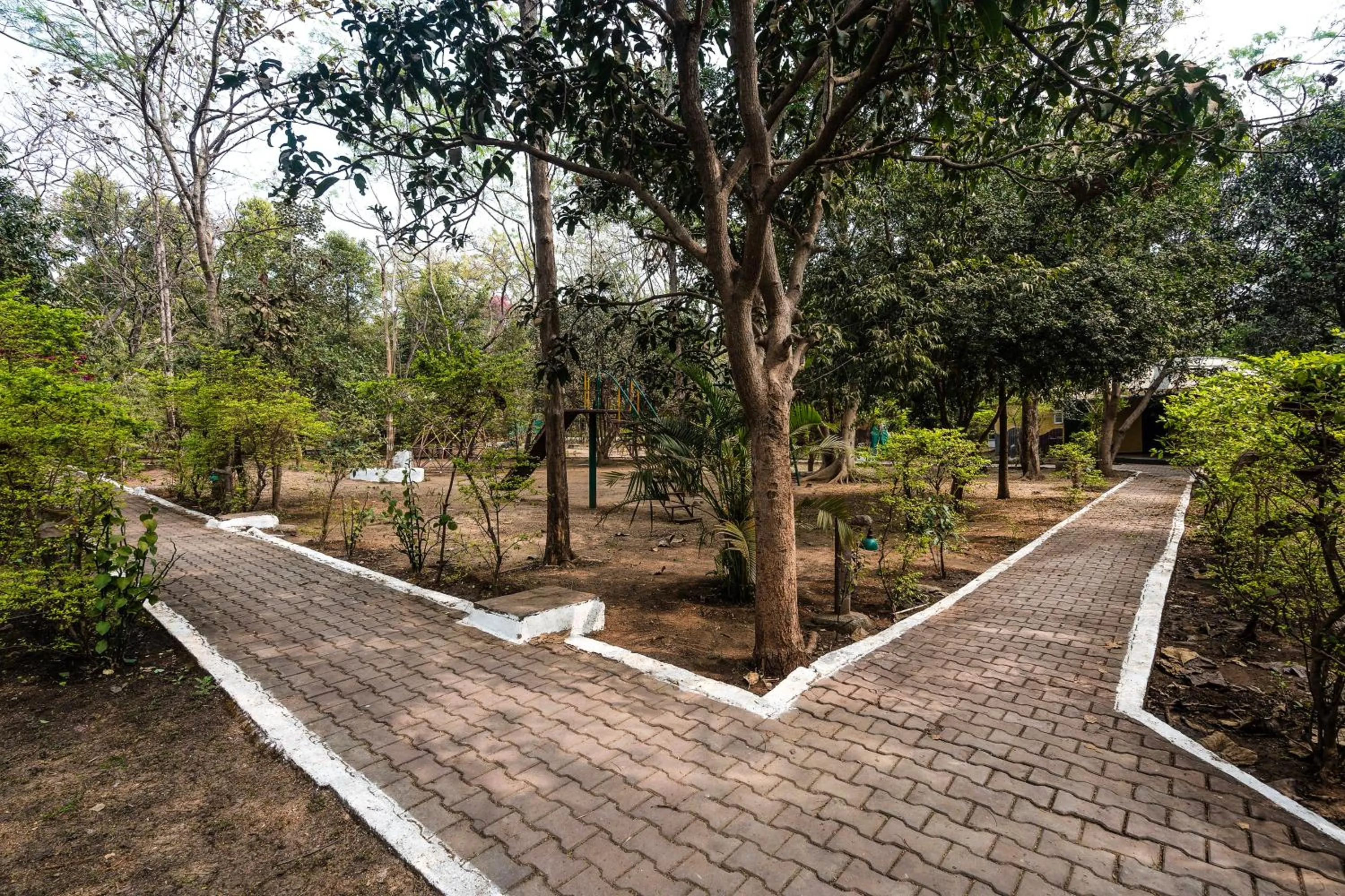 Garden in Treebo Premium Mowgli's Den Pench with Swimming Pool