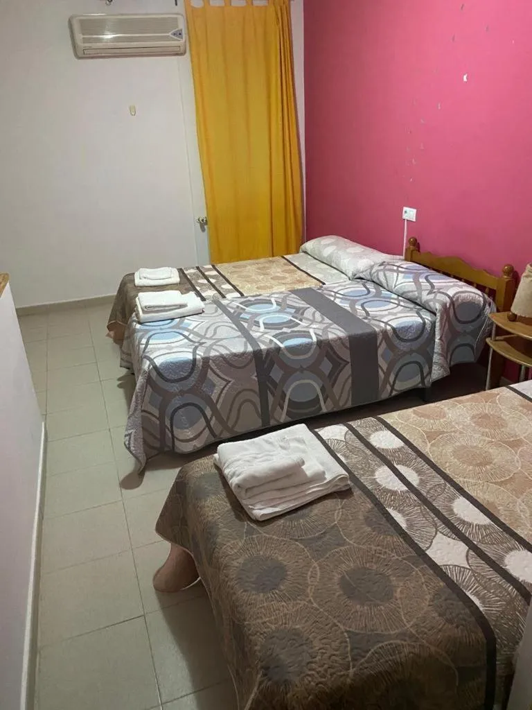 Bedroom, Bed in Hostal y Apartamentos la Vereda