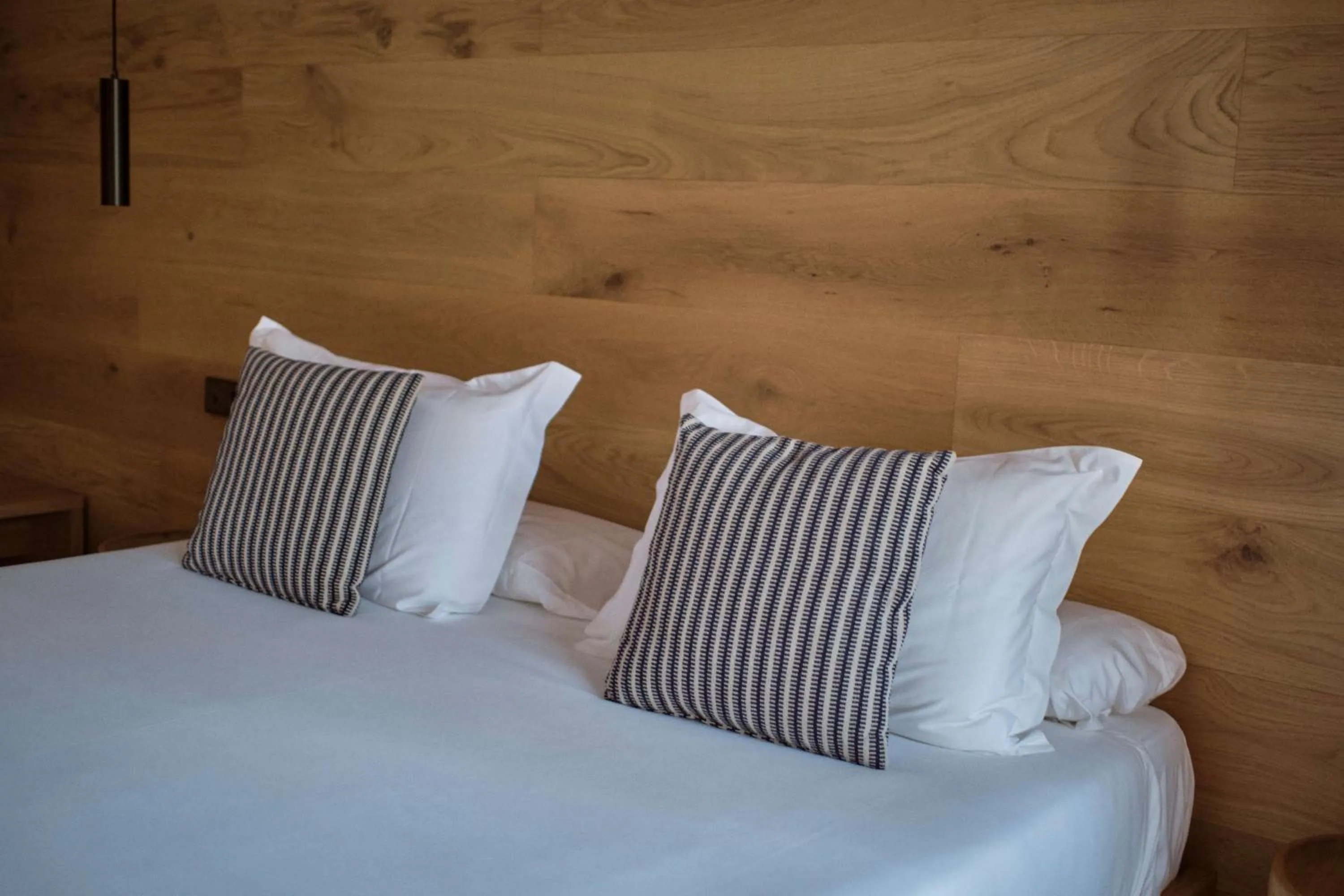 Bed in Las Gaviotas Suites Hotel & Spa