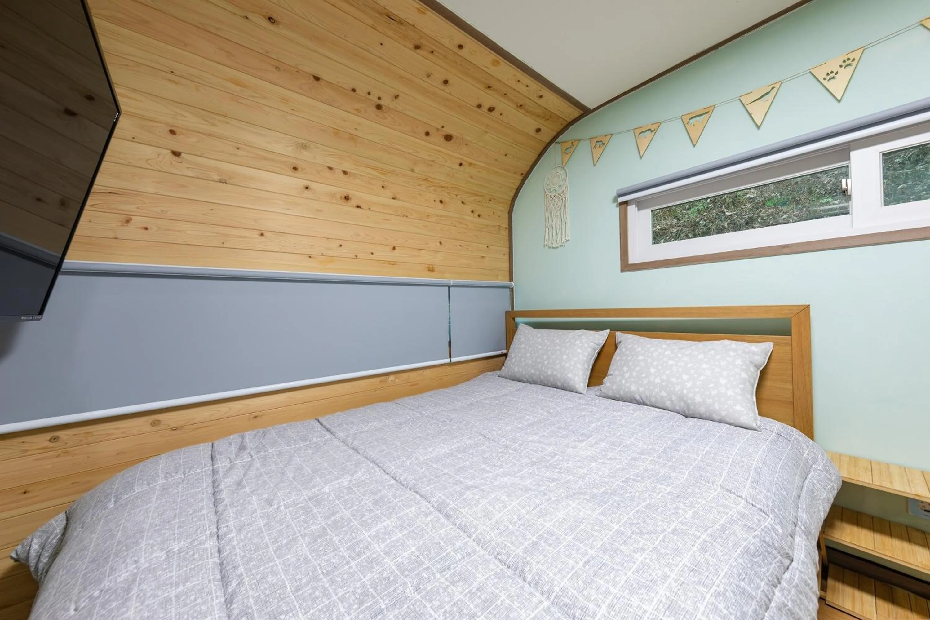 Bed in Jade Byeolbit Caravan