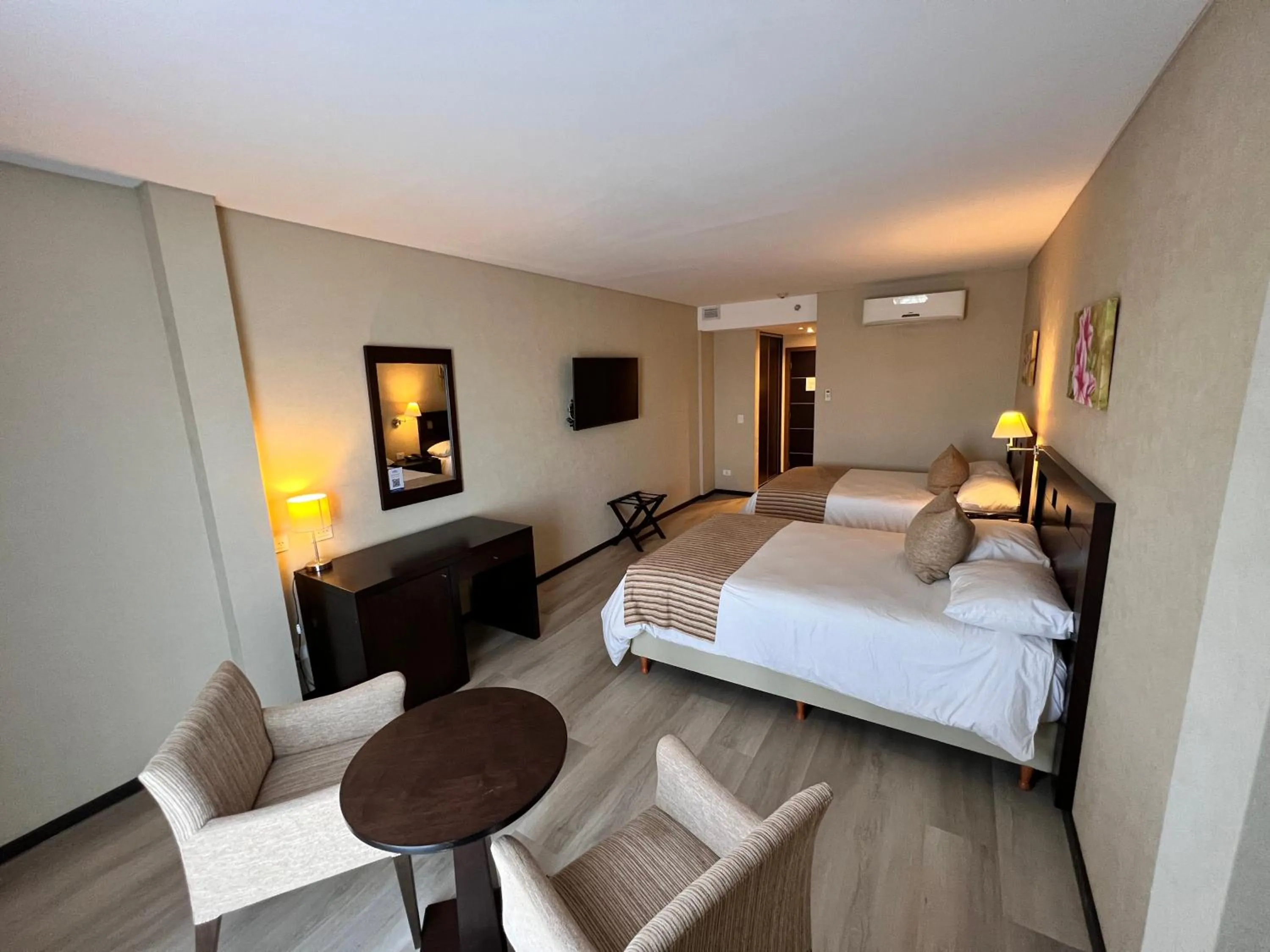 Bed in Howard Johnson Hotel & Resort Funes