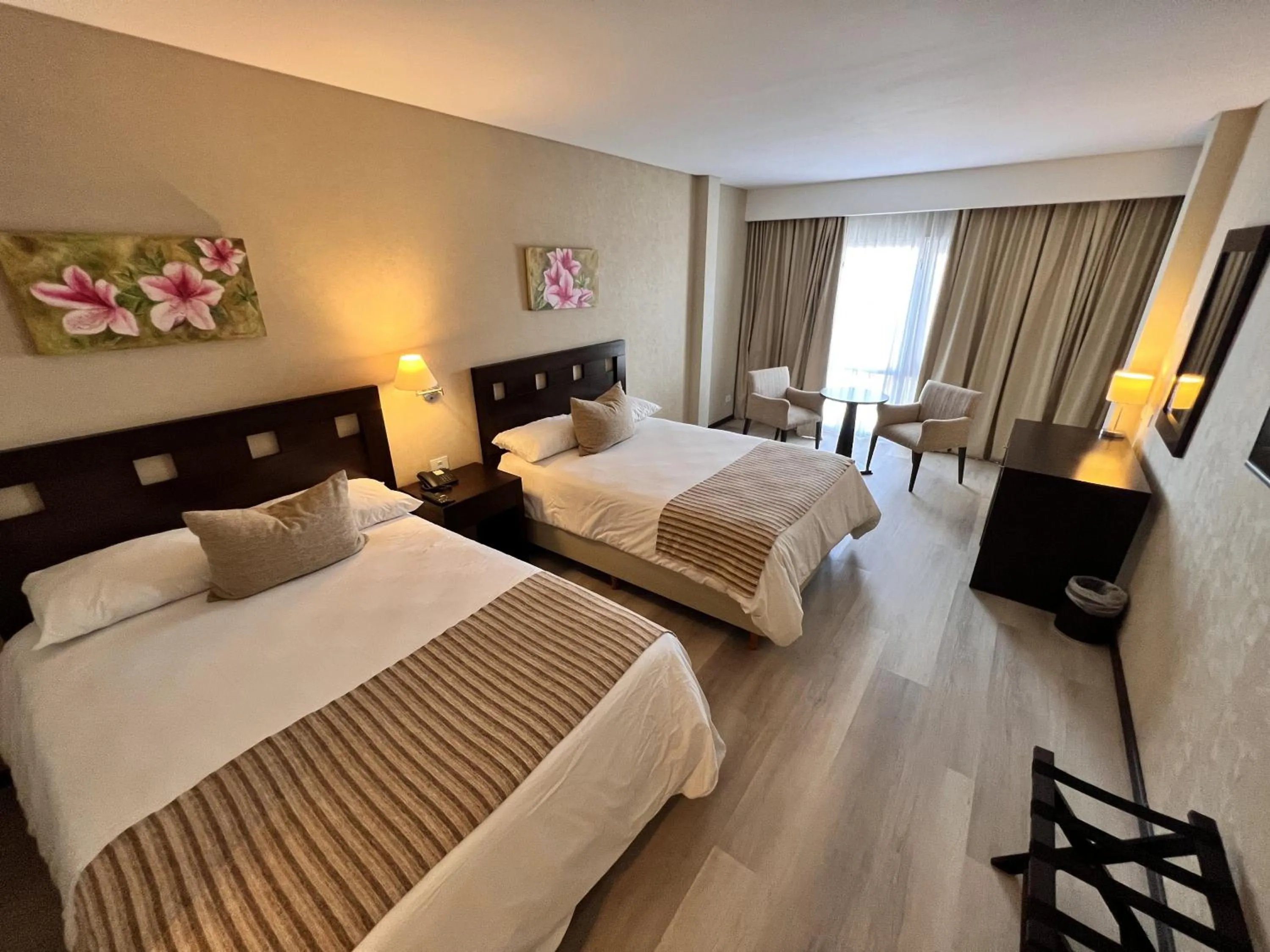 Bed in Howard Johnson Hotel & Resort Funes