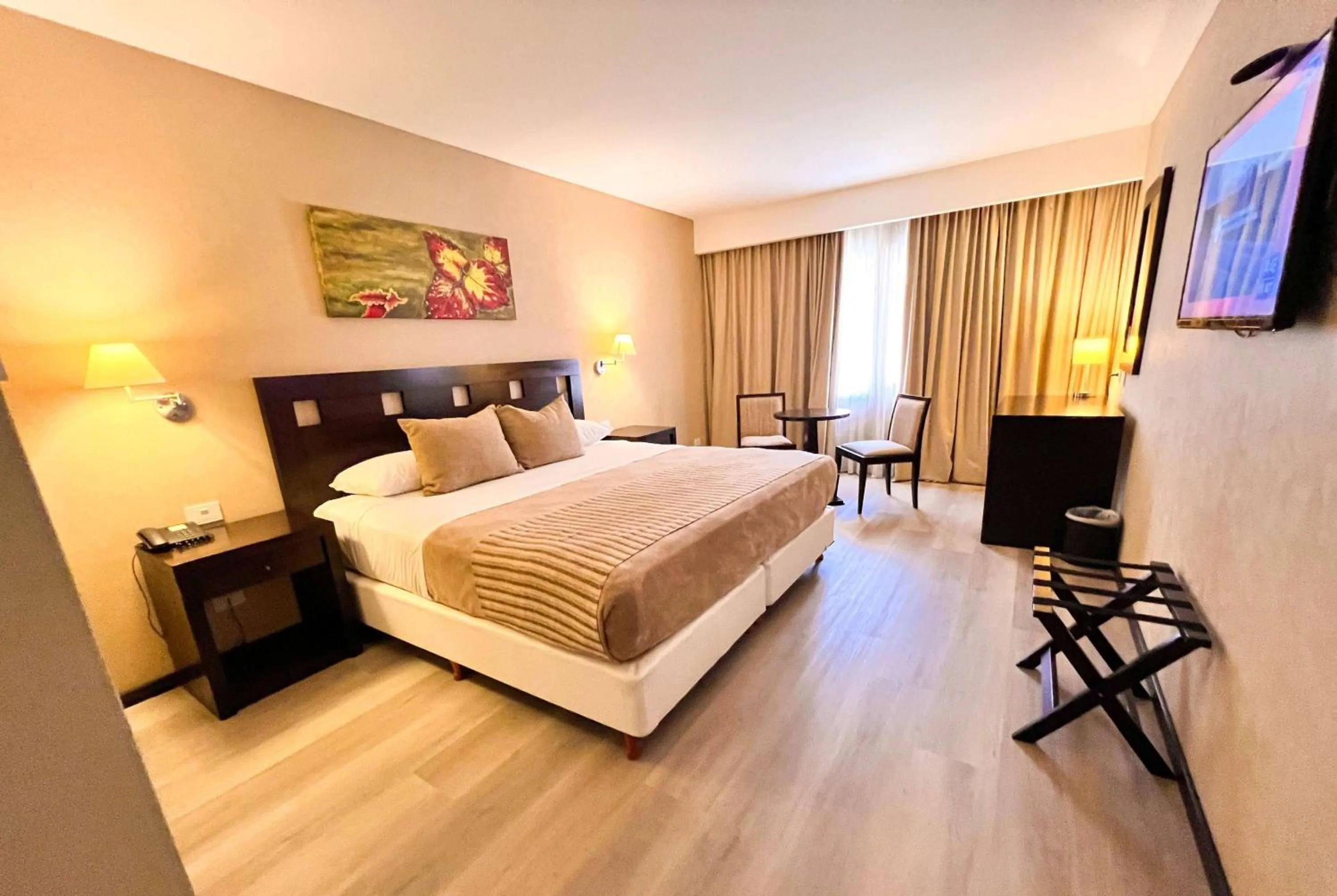 Photo of the whole room, Bed in Howard Johnson Hotel & Resort Funes