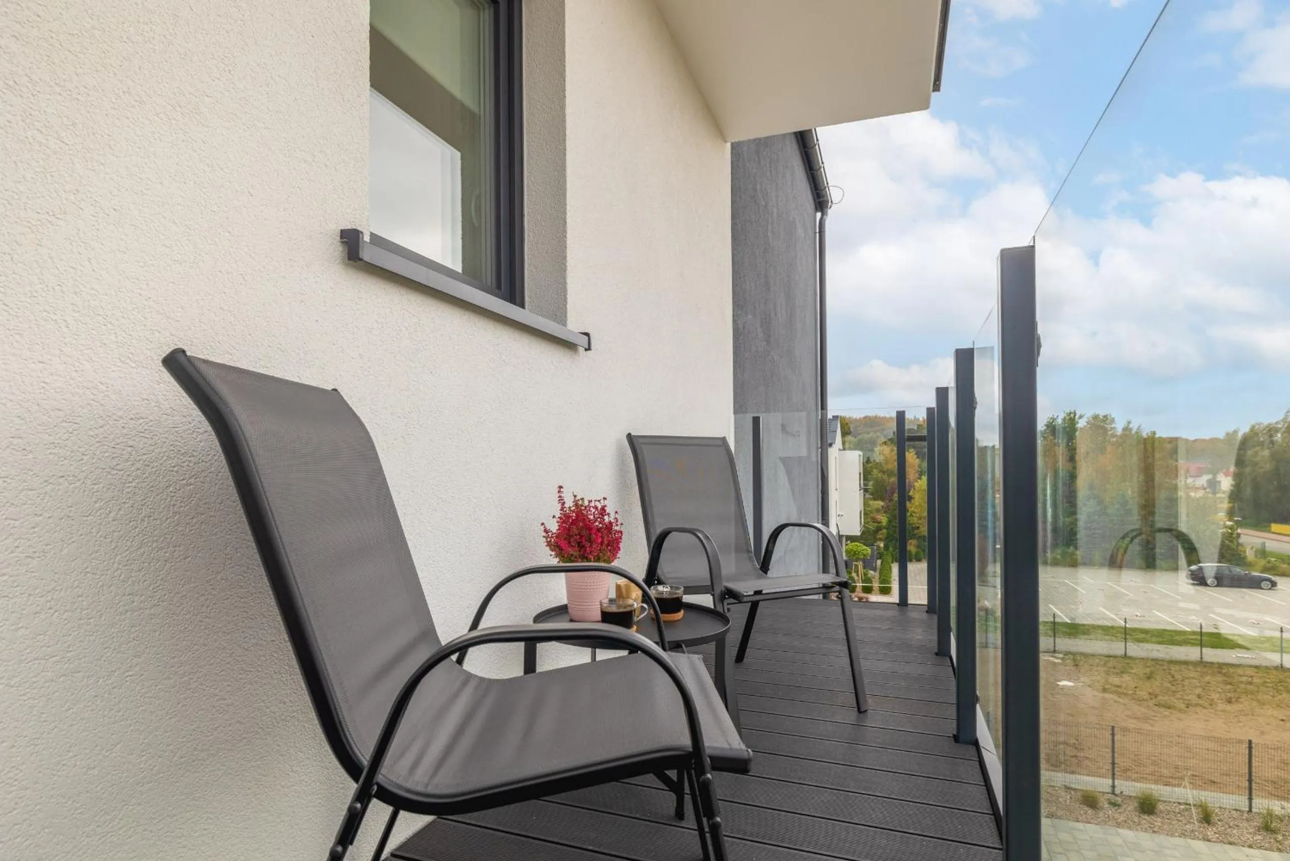 Balcony/Terrace in Szprotka Apartment with Air-Conditioning & Parking by Noclegi Renters