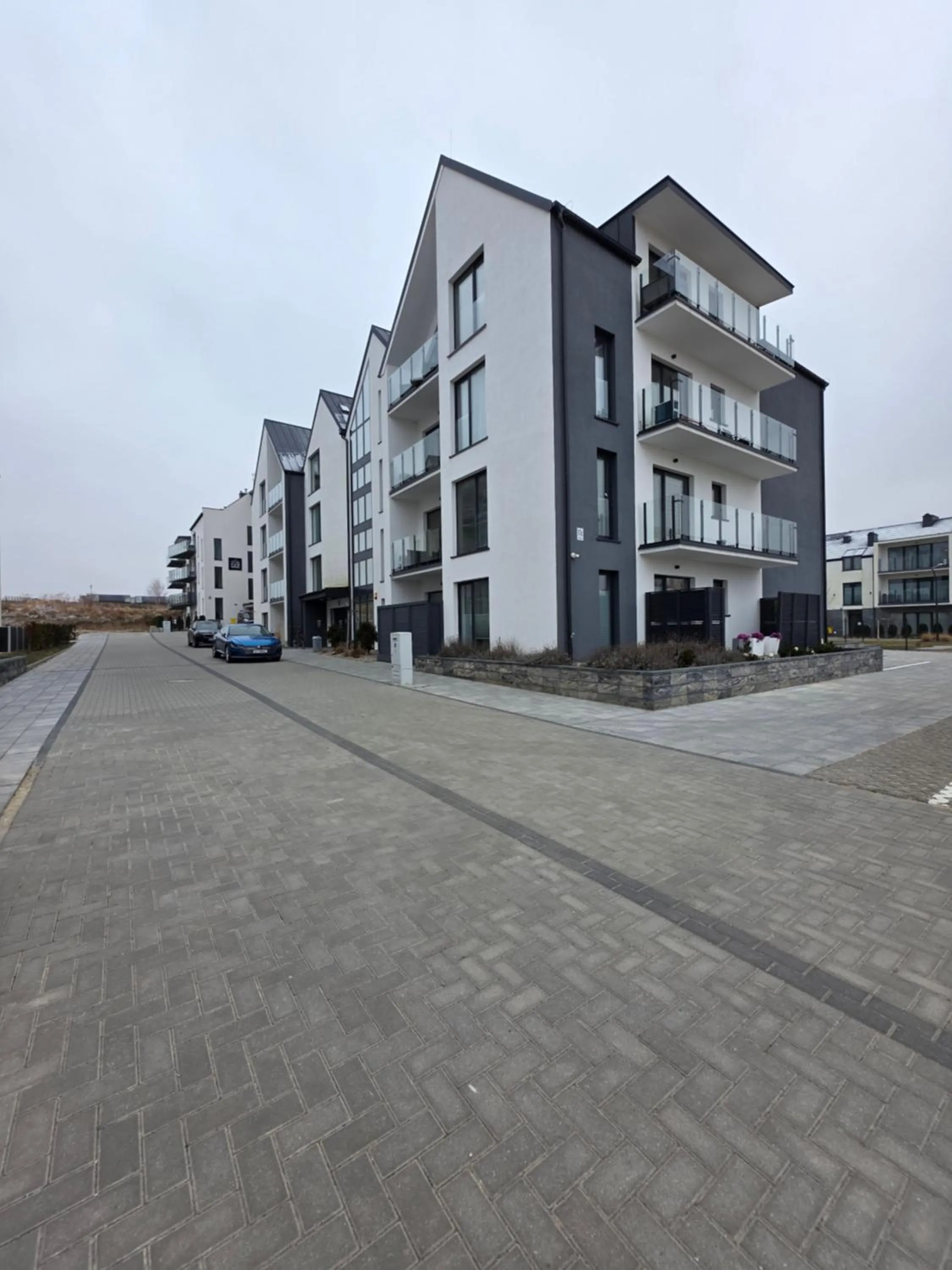 Property building in Szprotka Apartment with Air-Conditioning & Parking by Noclegi Renters
