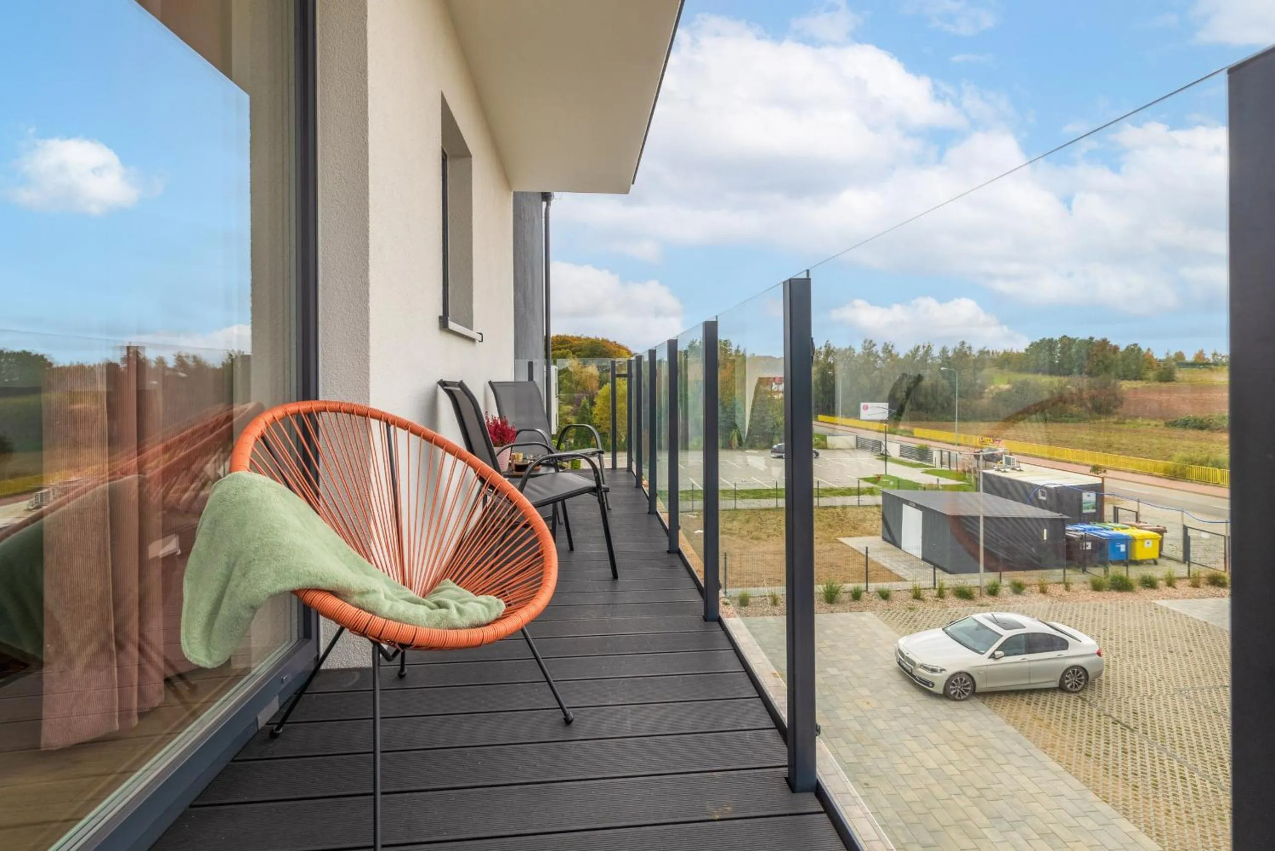 Balcony/Terrace in Szprotka Apartment with Air-Conditioning & Parking by Noclegi Renters