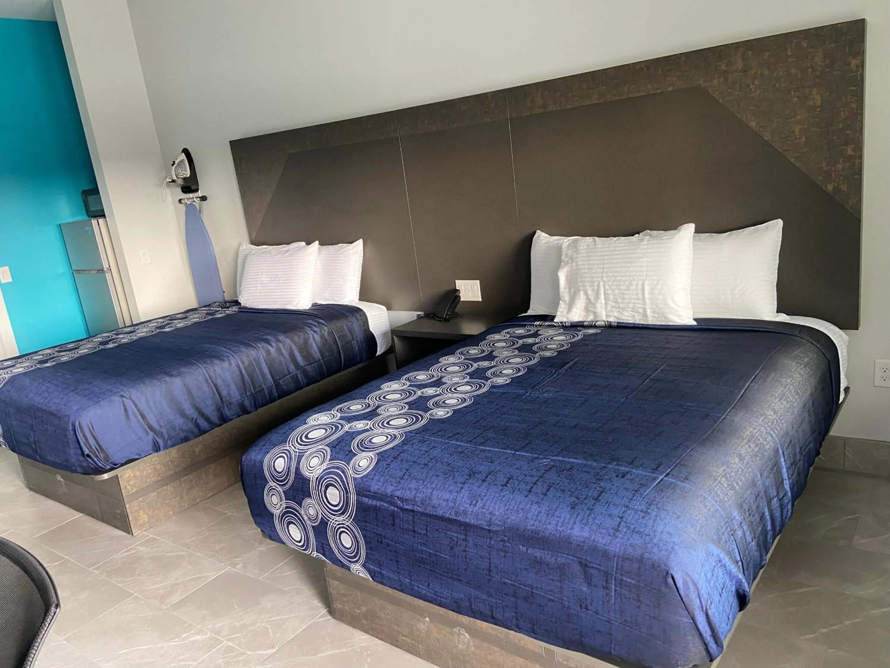 Bed in LiV Inn & Suites Houston