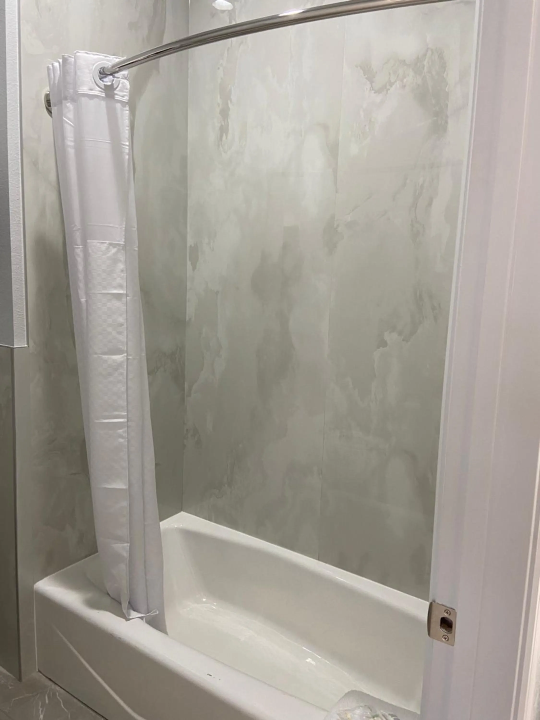 Shower in LiV Inn & Suites Houston