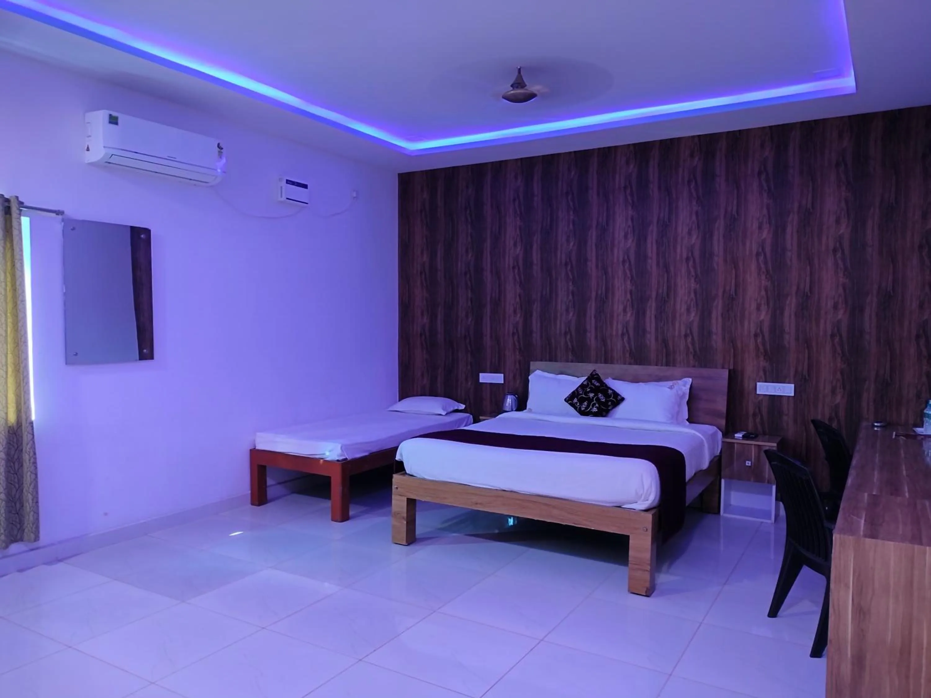 Bed in Thavika O Nila Resort & Convention Centre