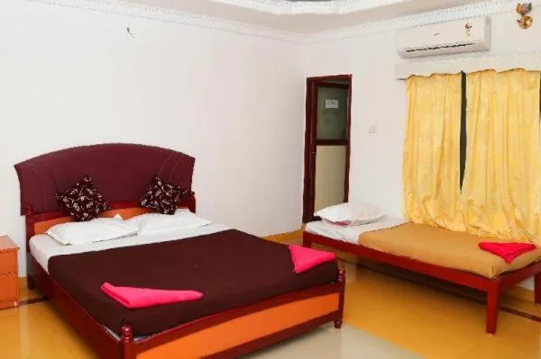 Bed in Thavika O Nila Resort & Convention Centre