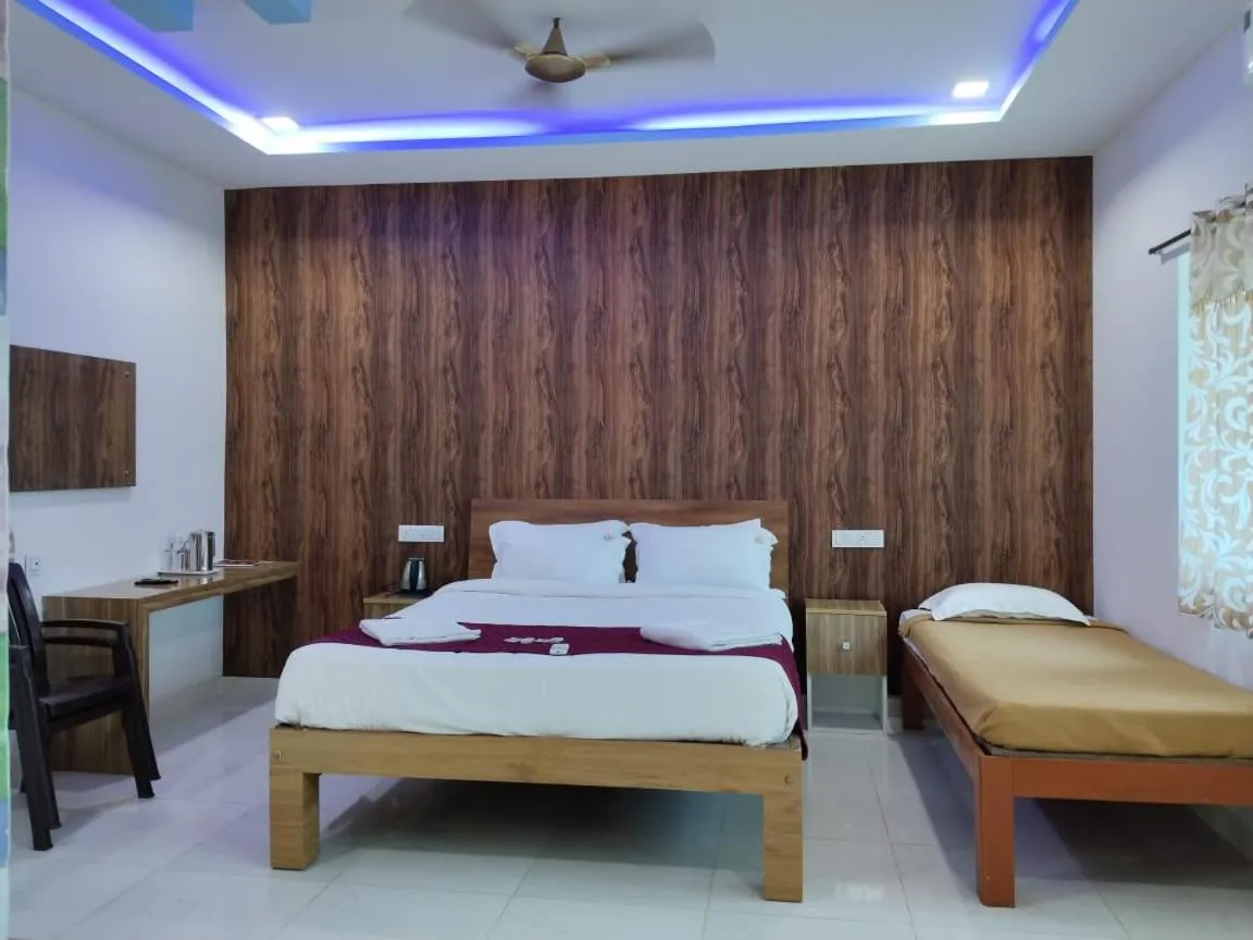 Bed in Thavika O Nila Resort & Convention Centre