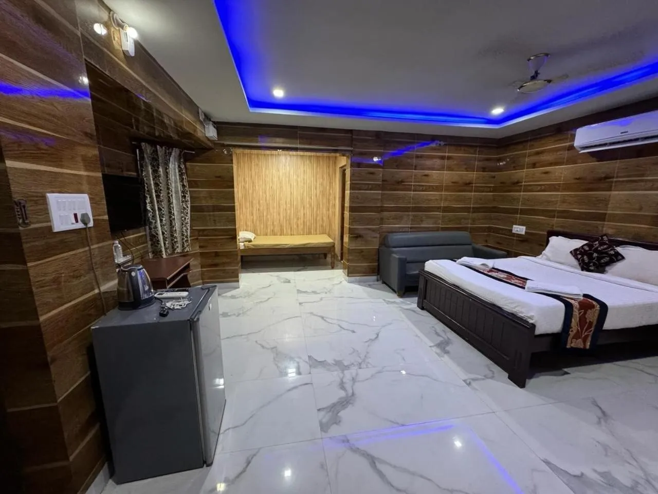 Bed in Thavika O Nila Resort & Convention Centre