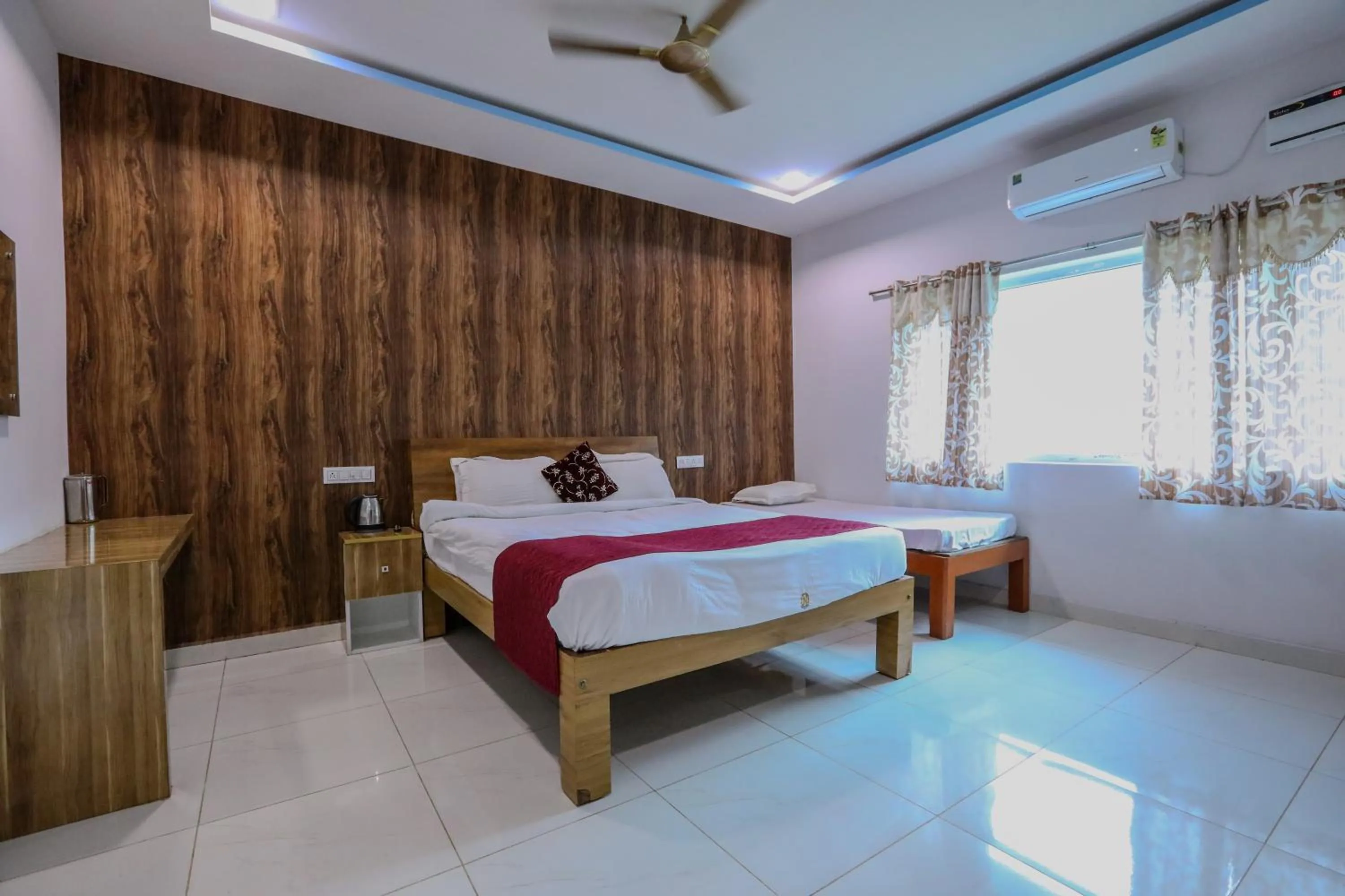 Bed in Thavika O Nila Resort & Convention Centre