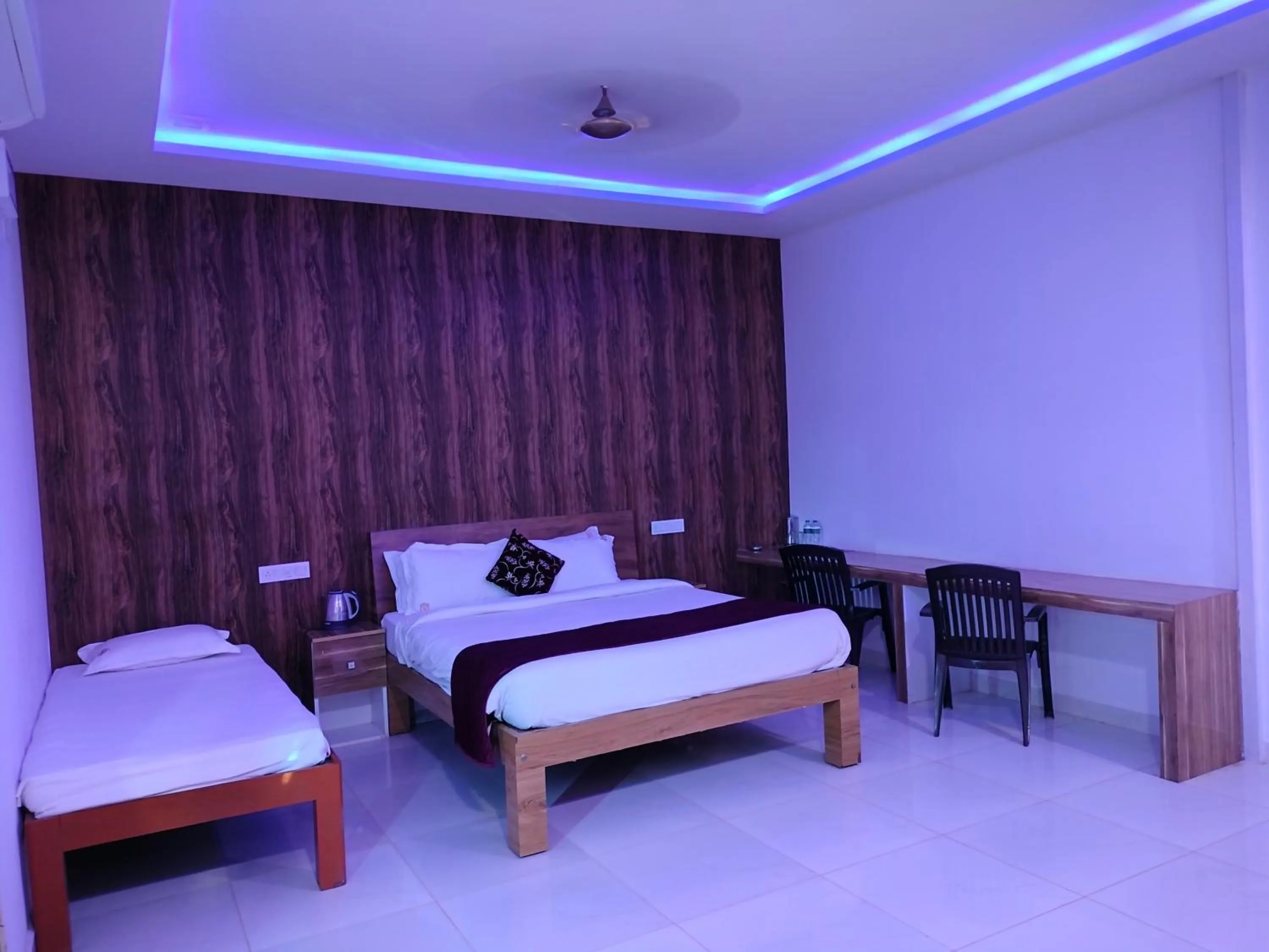 Bed in Thavika O Nila Resort & Convention Centre