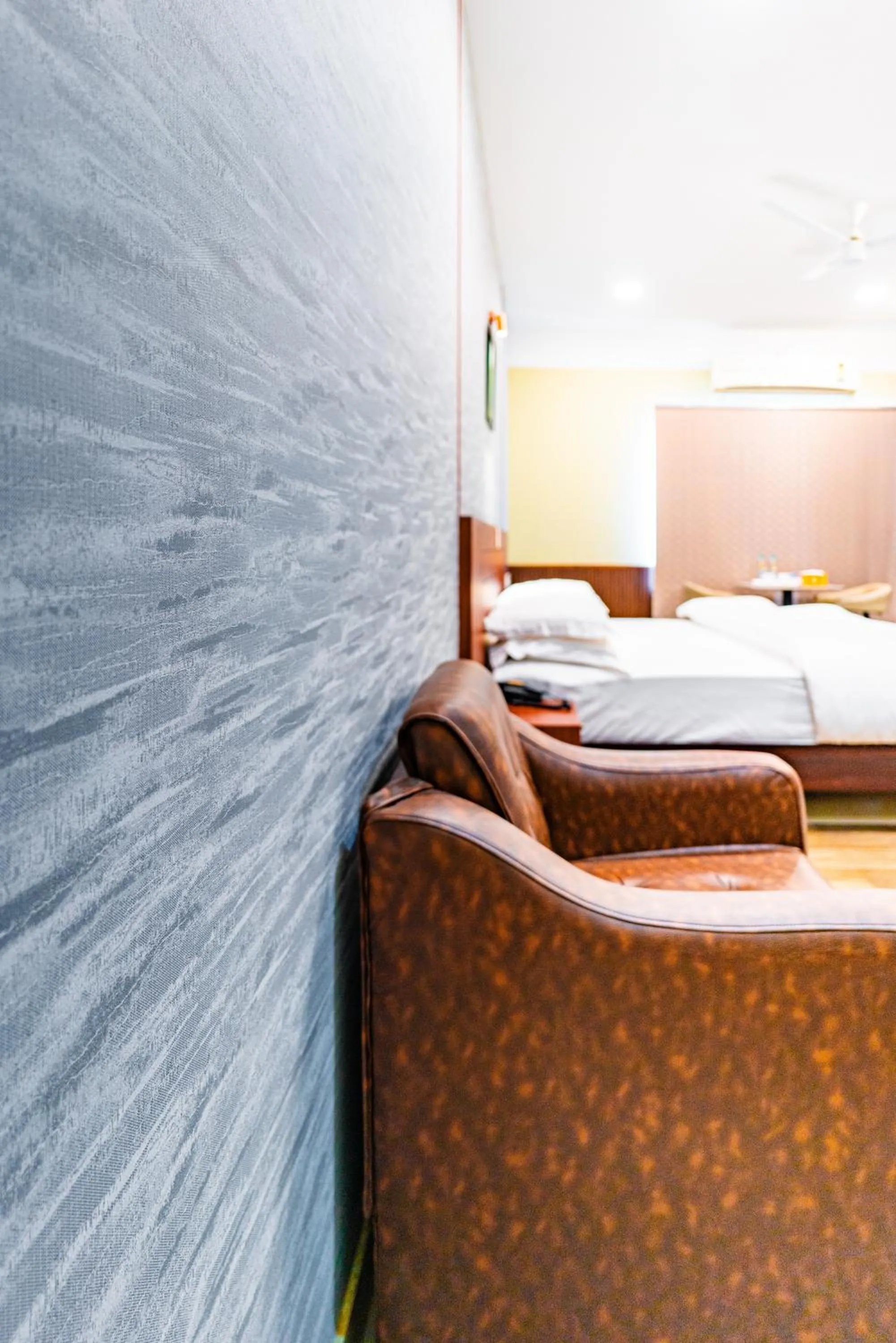 Seating area, Bed in Misty Rock Hotels