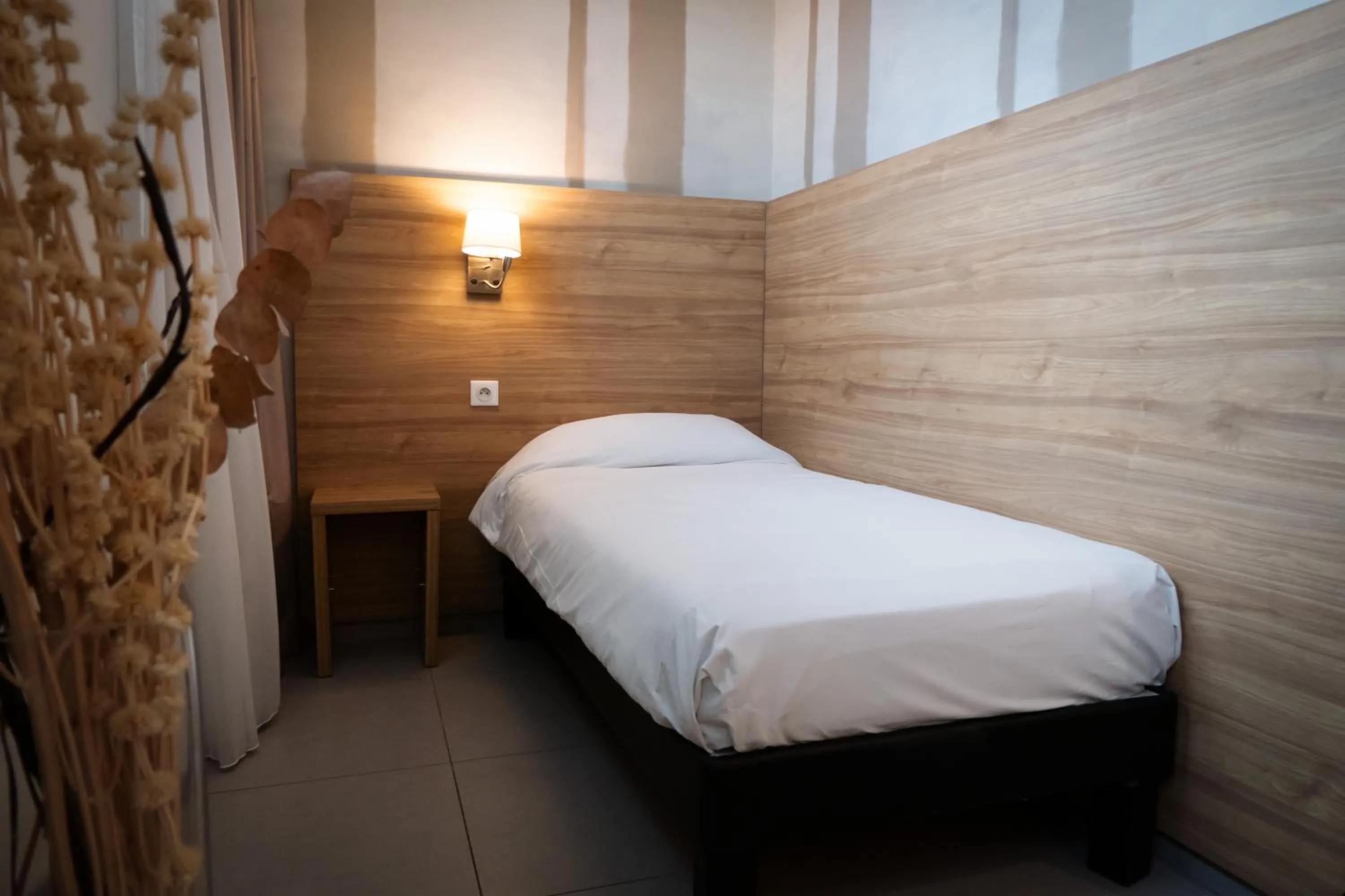Bed in Hôtel de la gare