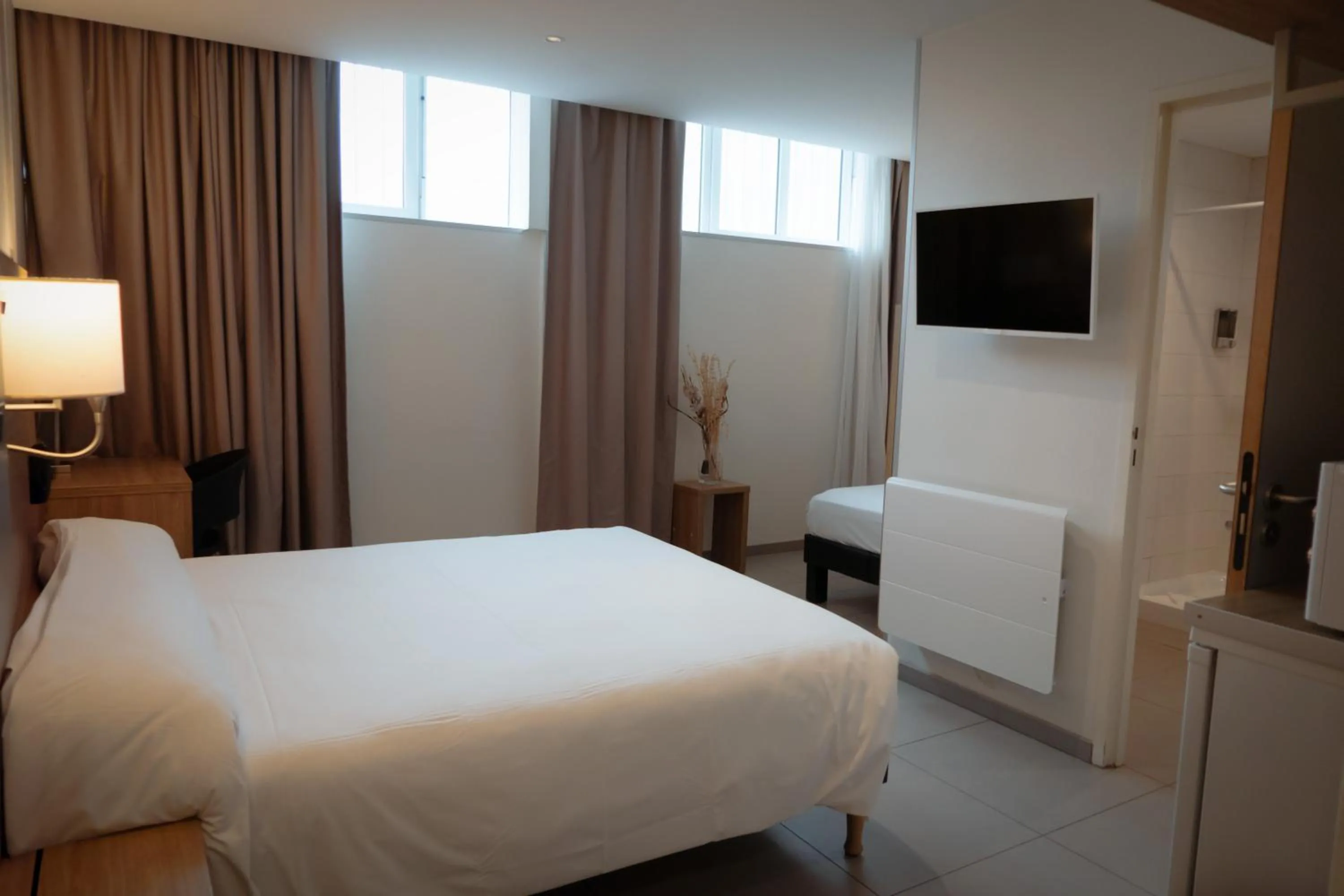 Bed in Hôtel de la gare