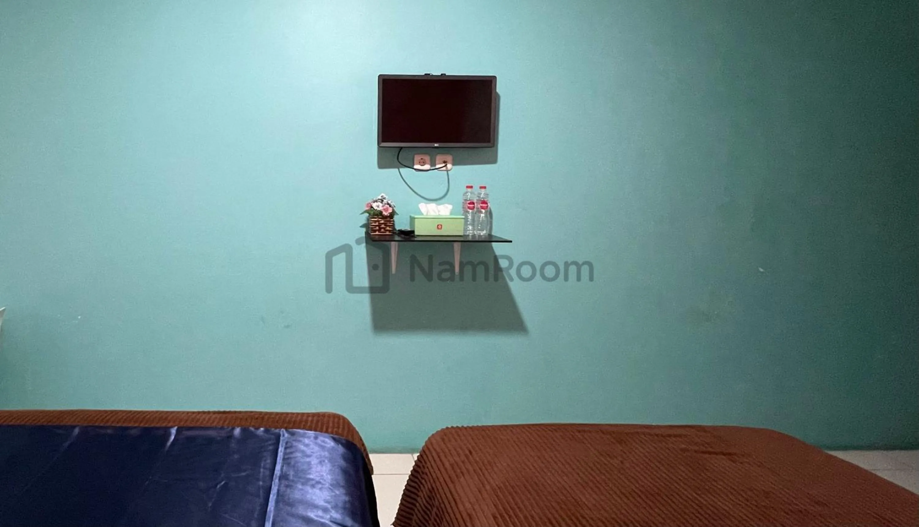 Bed in Cempaka Residence By NamRoom