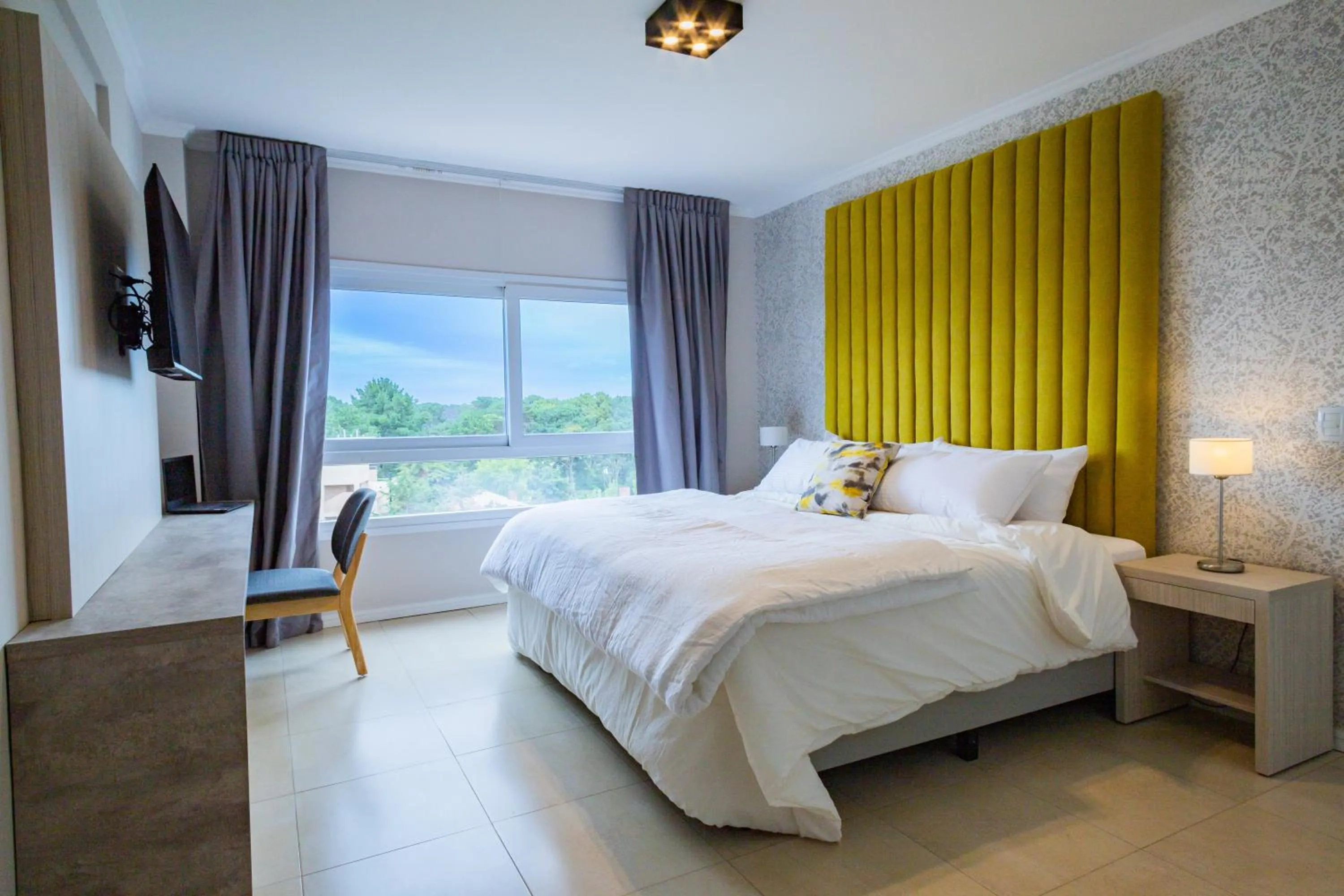 Photo of the whole room, Bed in Garden Suites Pinamar