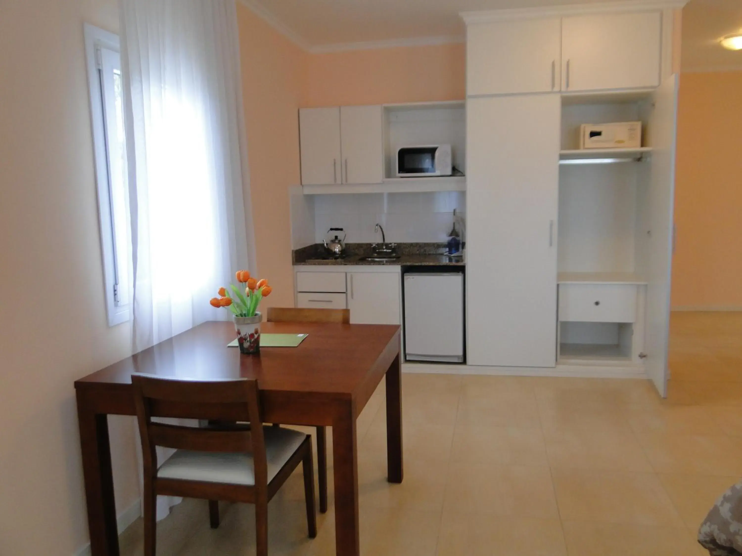 Photo of the whole room in Garden Suites Pinamar Photo of the whole room in Garden Suites Pinamar