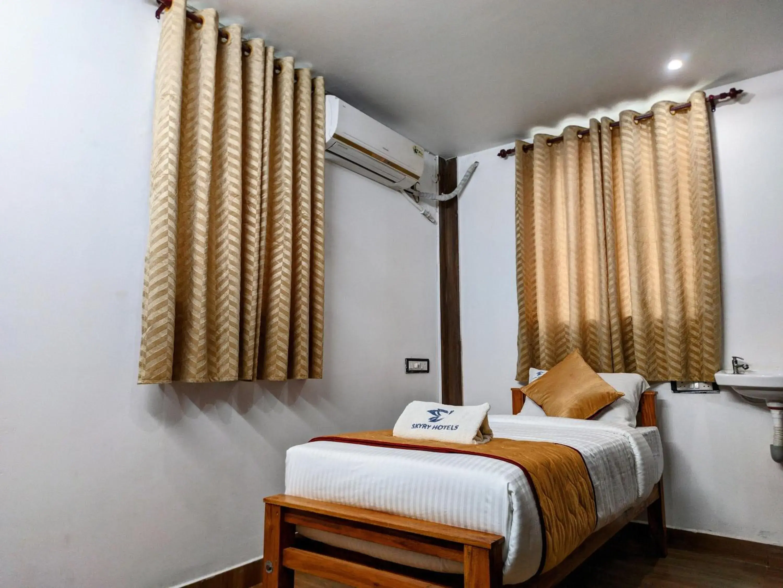 Bed in Skyry Hotels Singanallur Bed in Skyry Hotels Singanallur