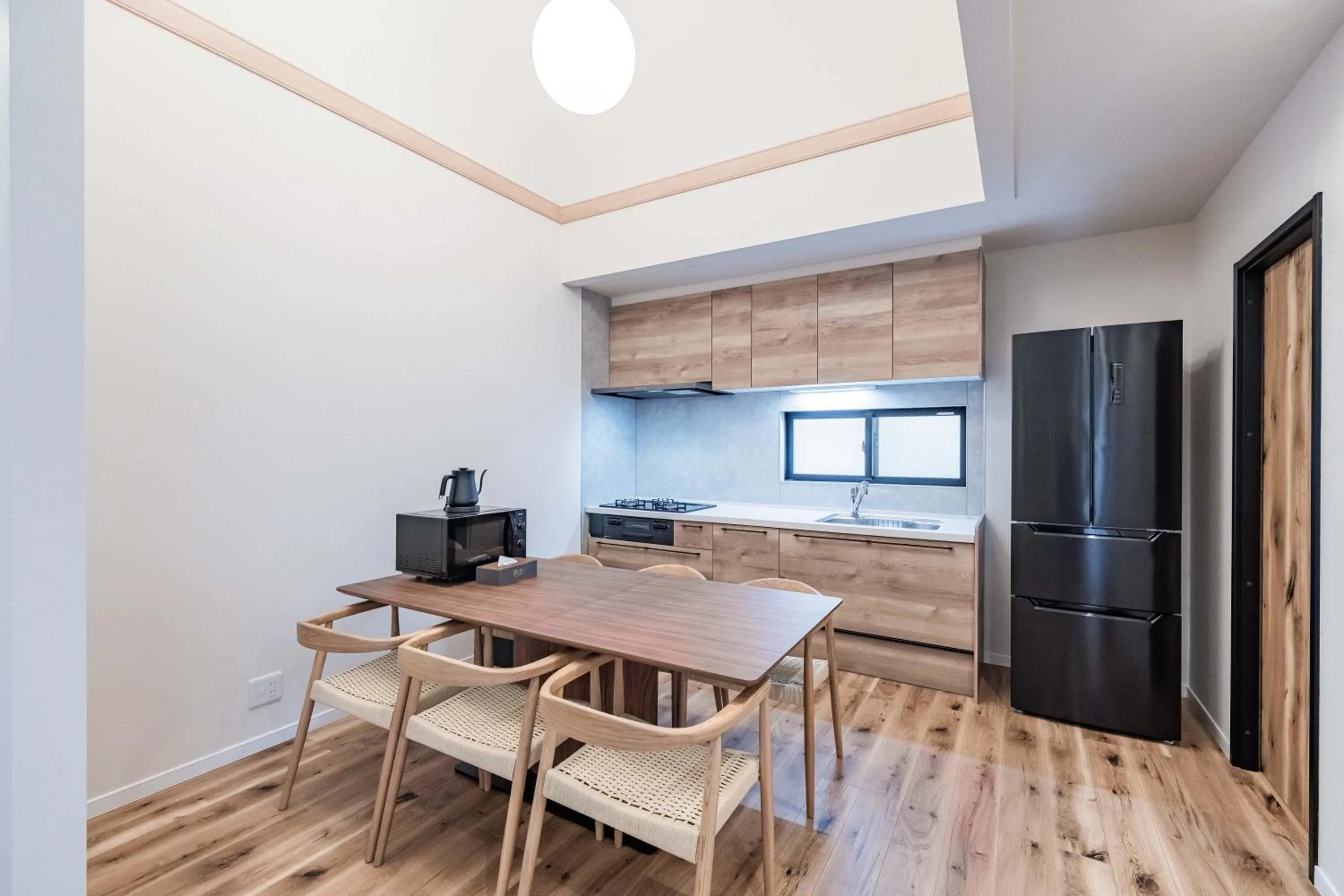 Kitchen or kitchenette in Apartment Hotel 11 Villa Hanazonocho