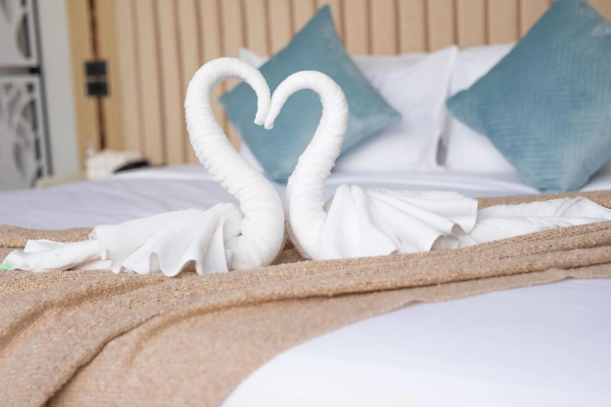 Bed in Best Time Pool Suites