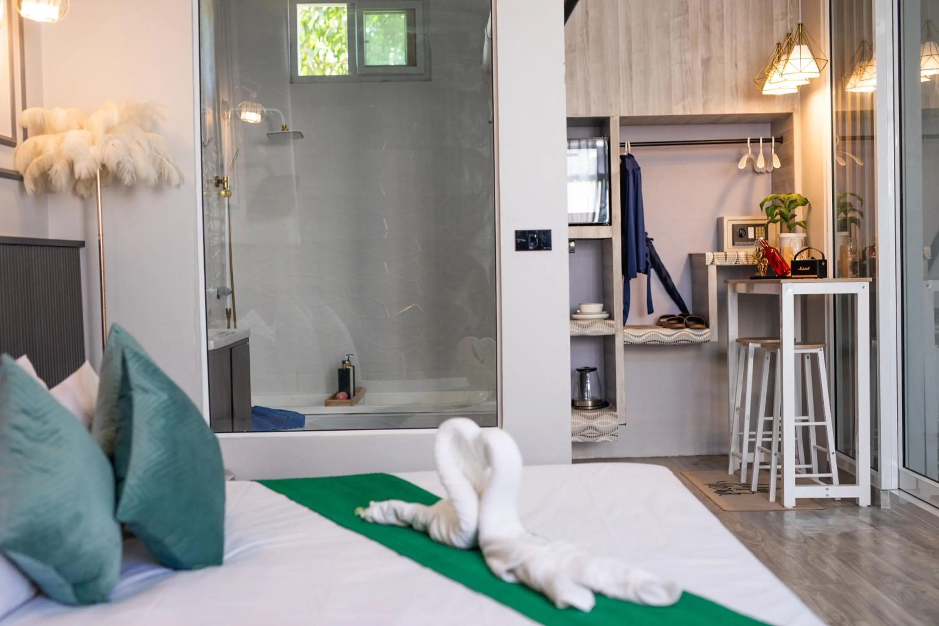 Bed in Best Time Pool Suites